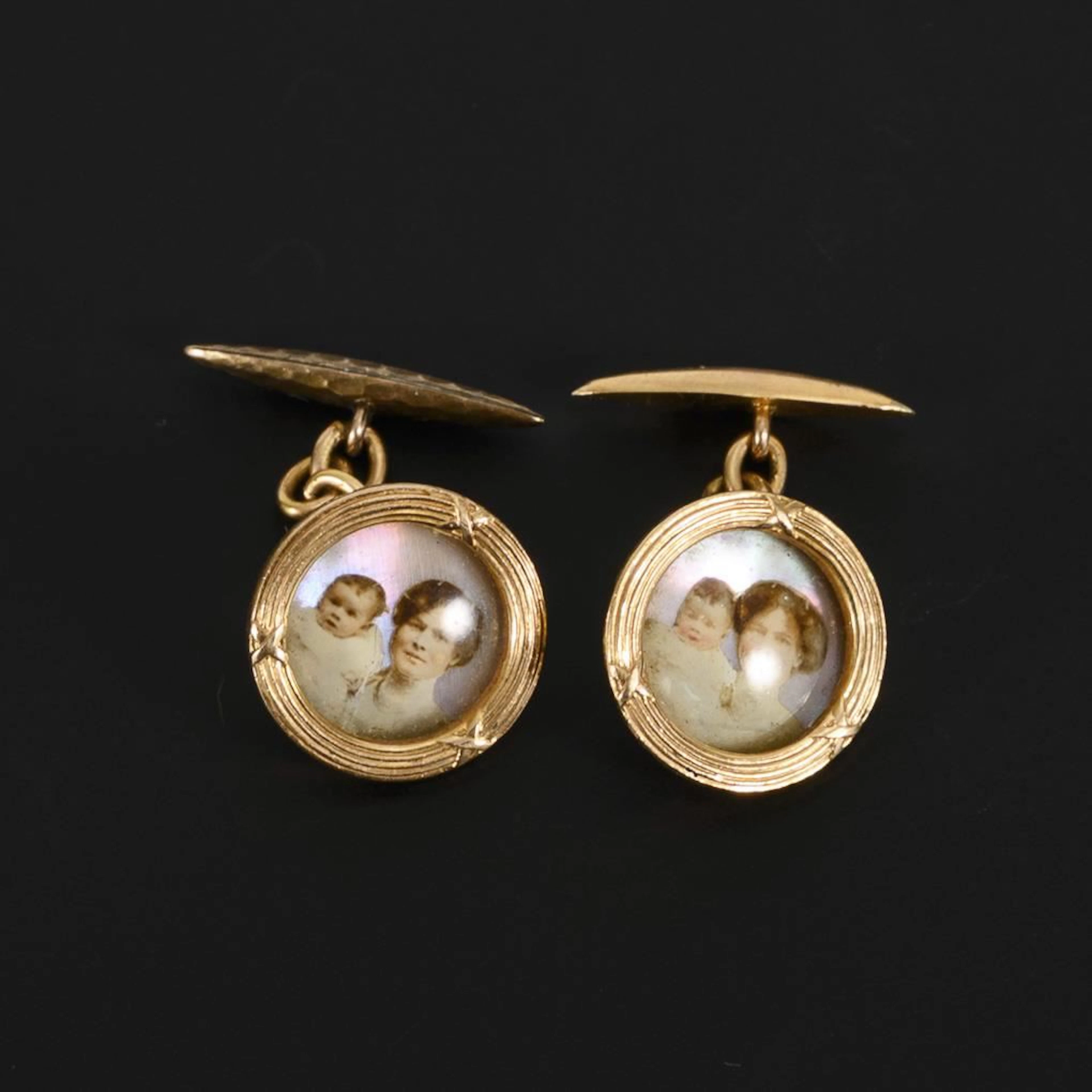 Art Nouveau cufflinks featuring portraits of a mother with her baby.