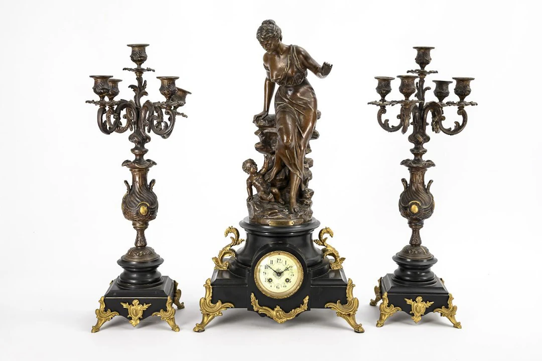 French pendulum clock with matching candelabra.