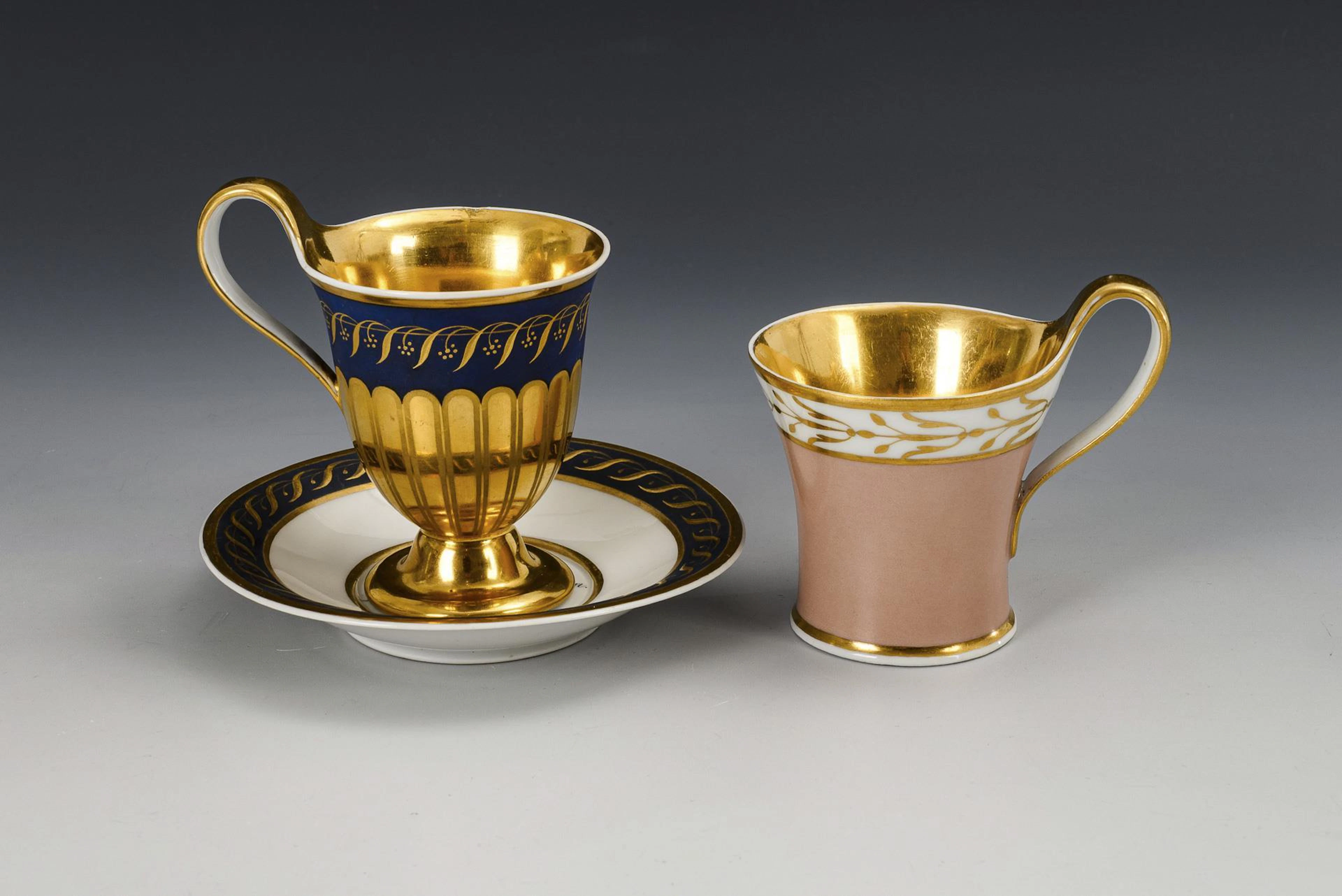 2 empire vitrine cups. KPM Berlin.