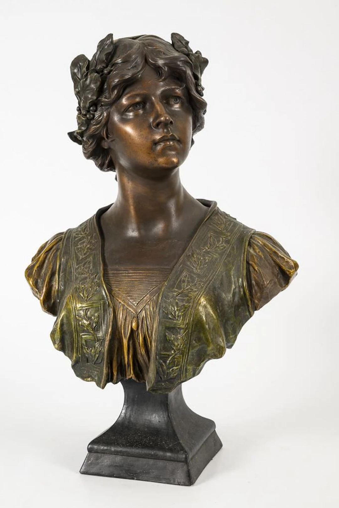 Bust of a young woman with a laurel wreath.