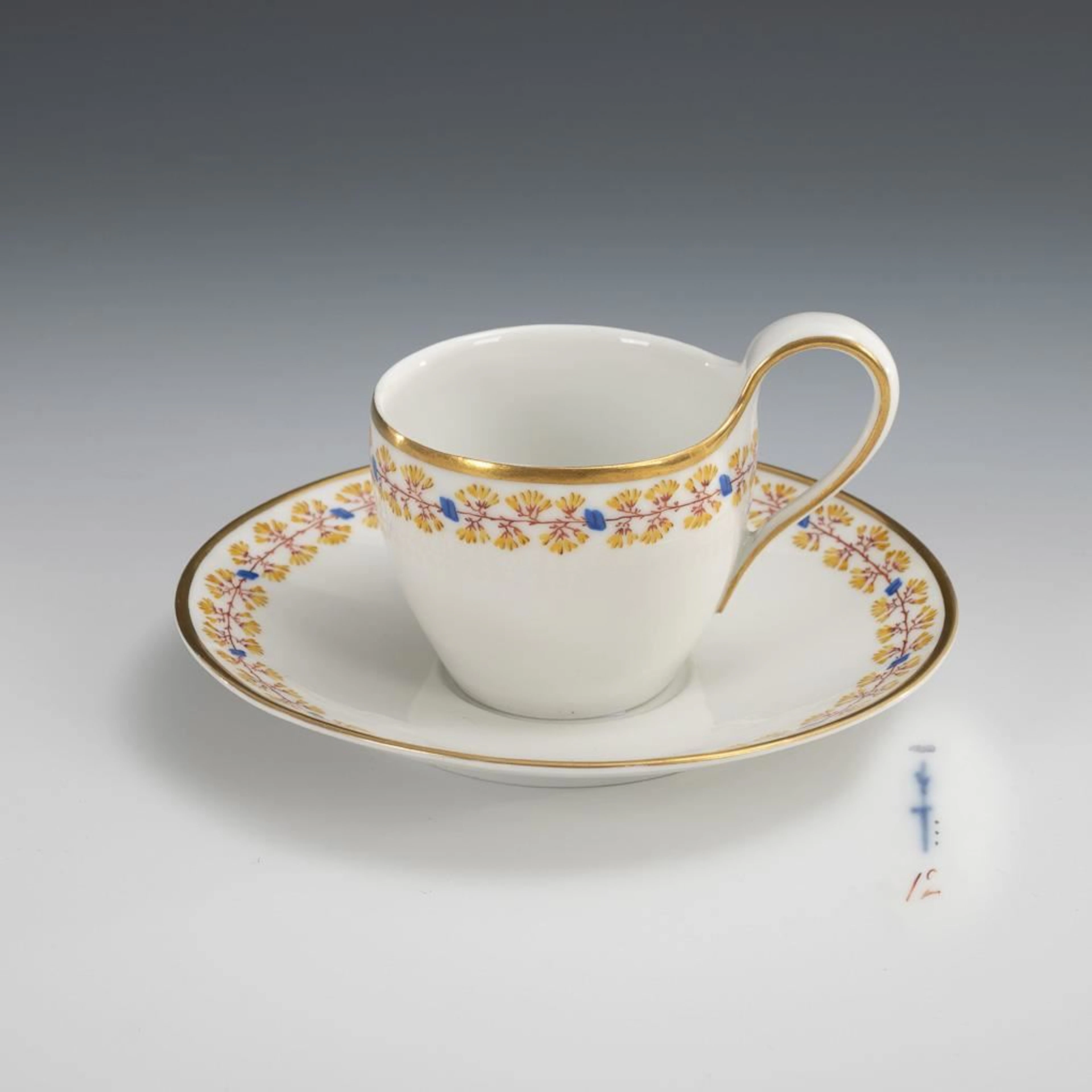 Display cup with floral border. KPM Berlin.