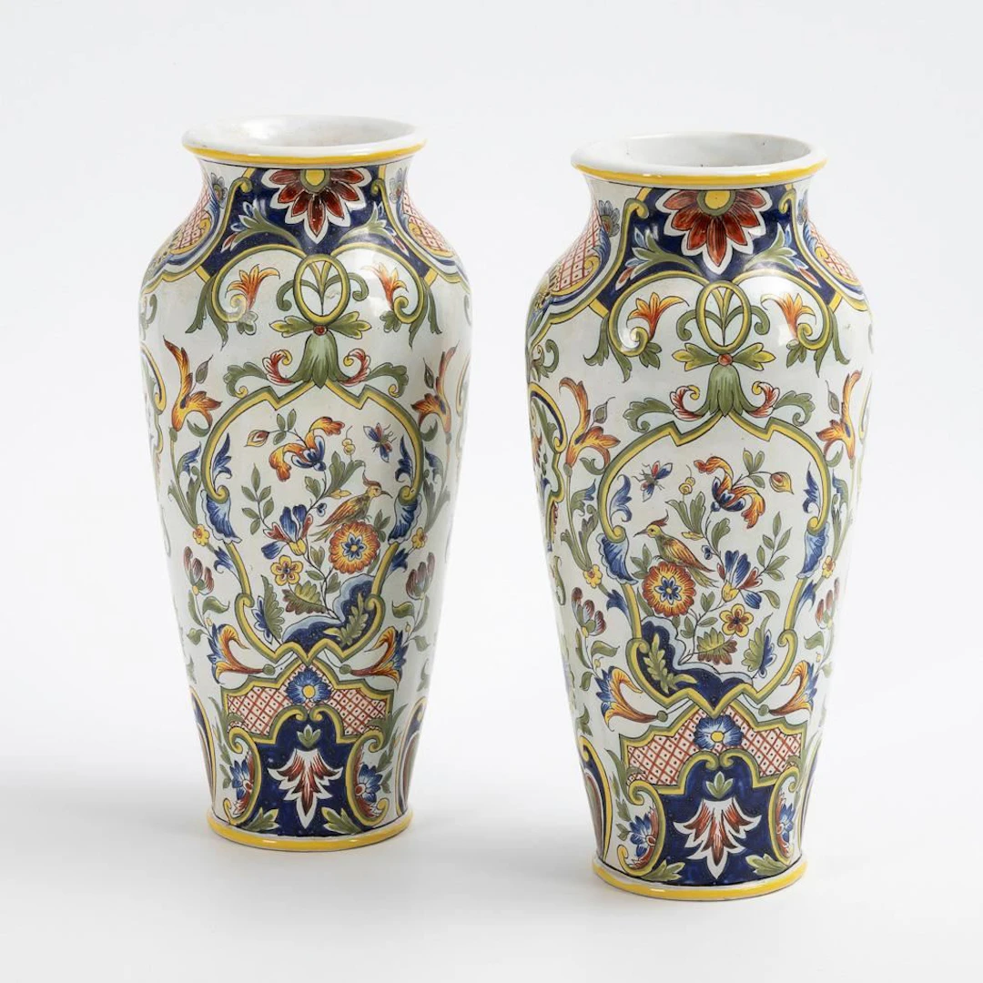 Pair of faience vases with chinoiserie motifs.