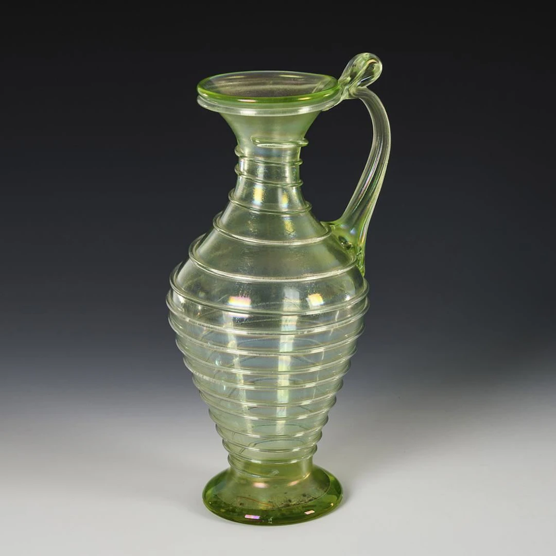 Antique-style handle bottle. Lötz.