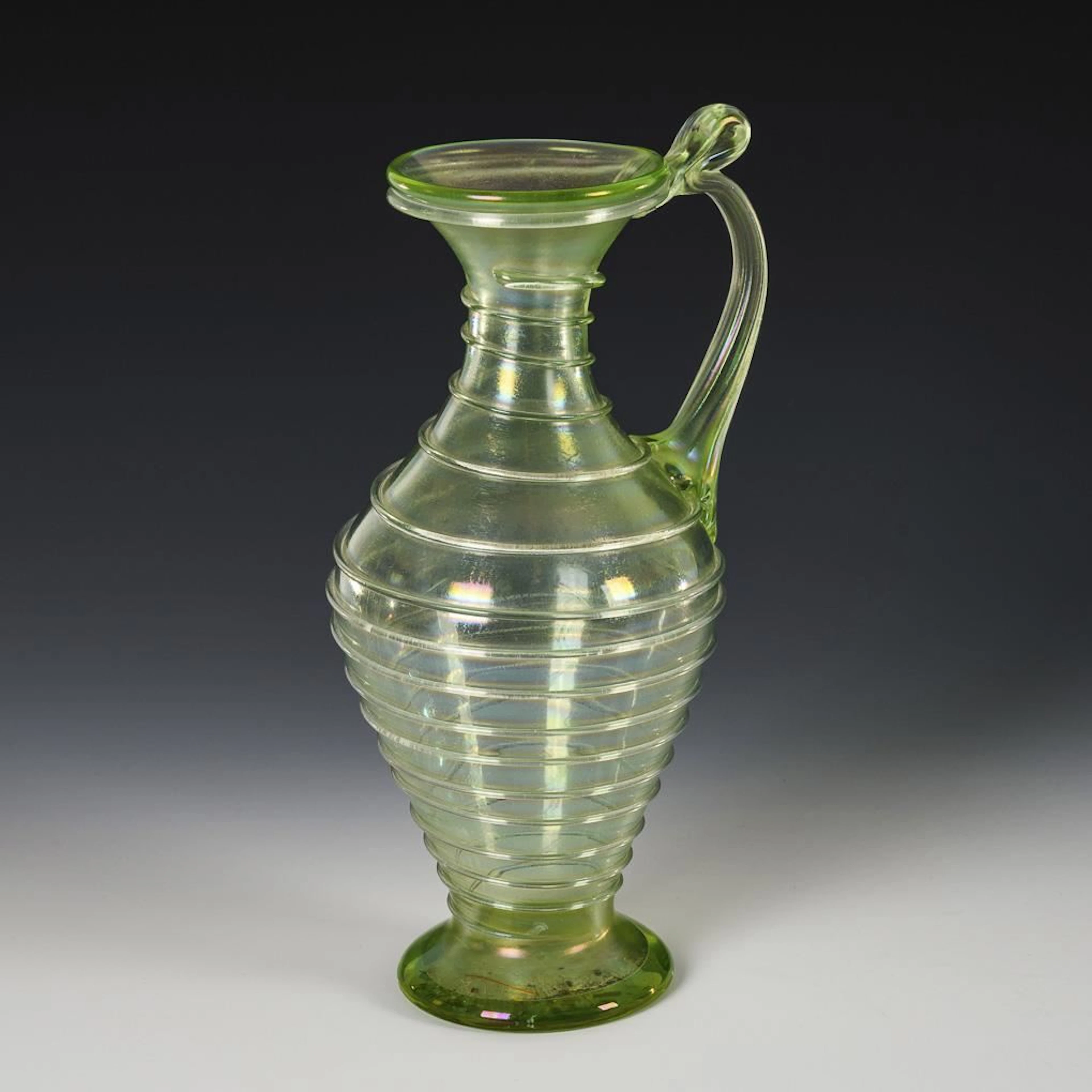Antique-style handle bottle. Lötz.