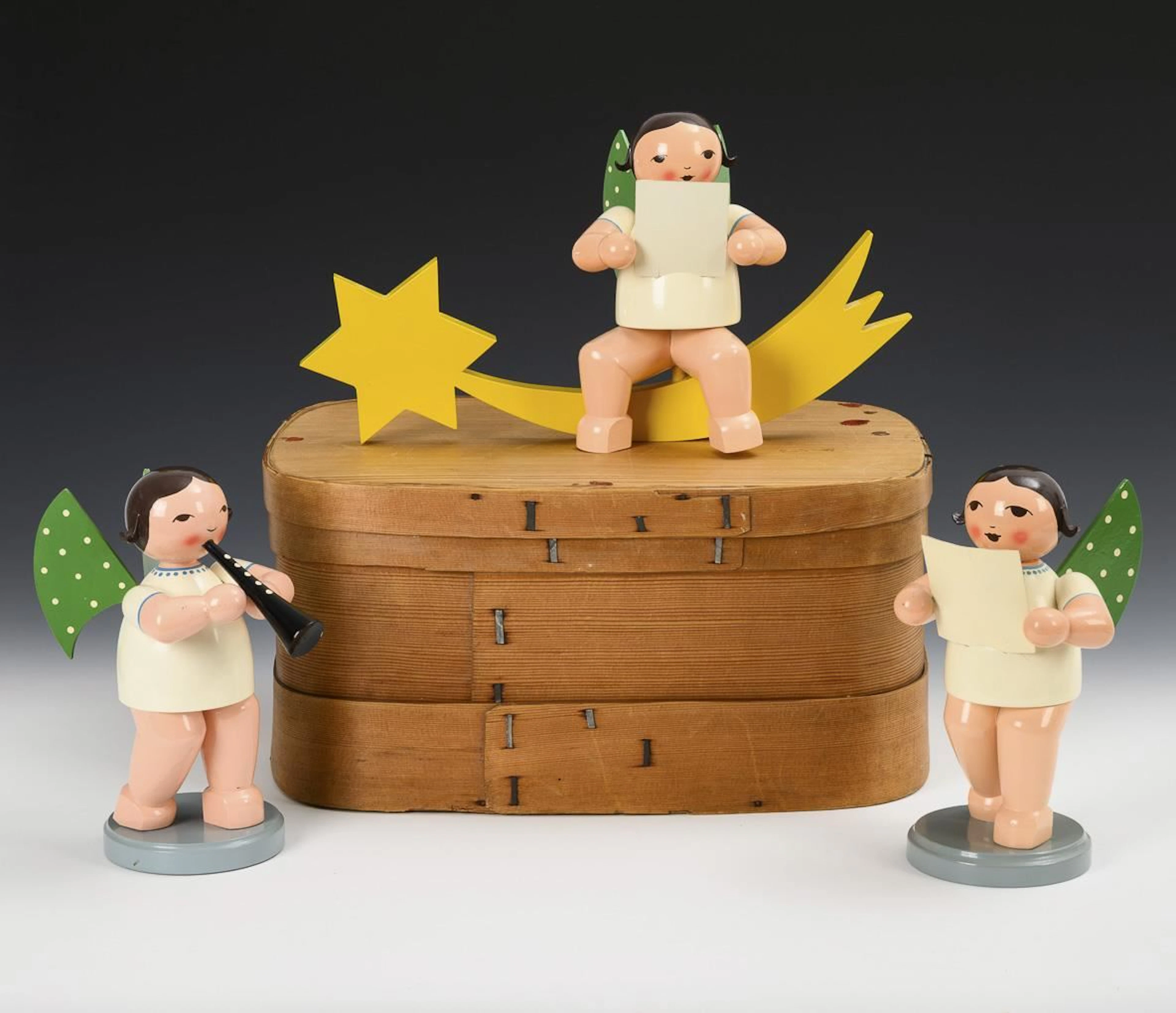3 large angels in an old chipboard box.