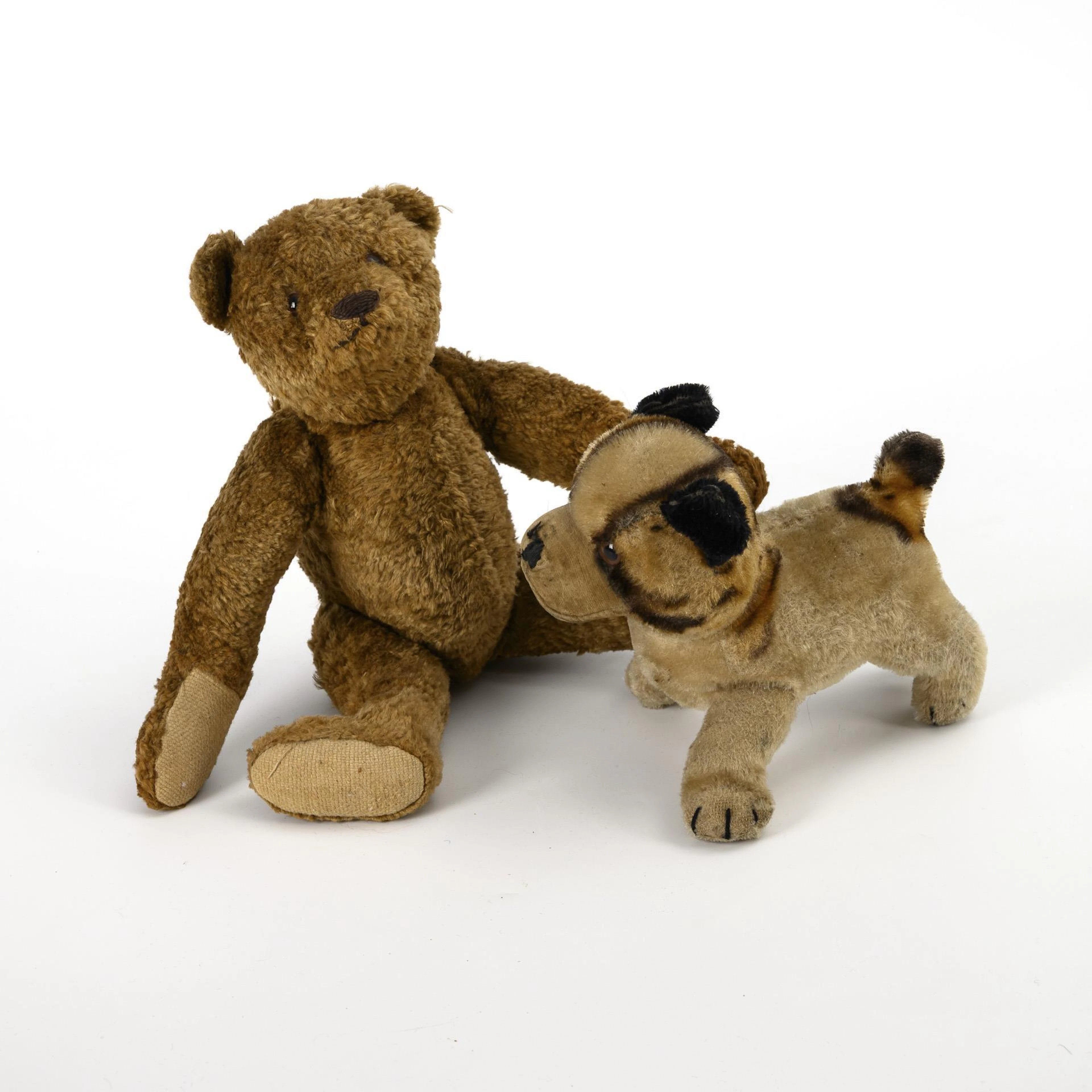 Brown teddy bear and "Bully". Steiff.