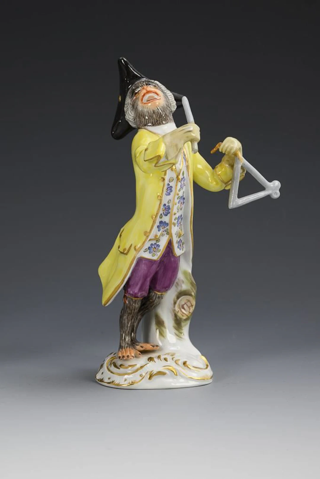 Monkey playing the triangle. Meissen.