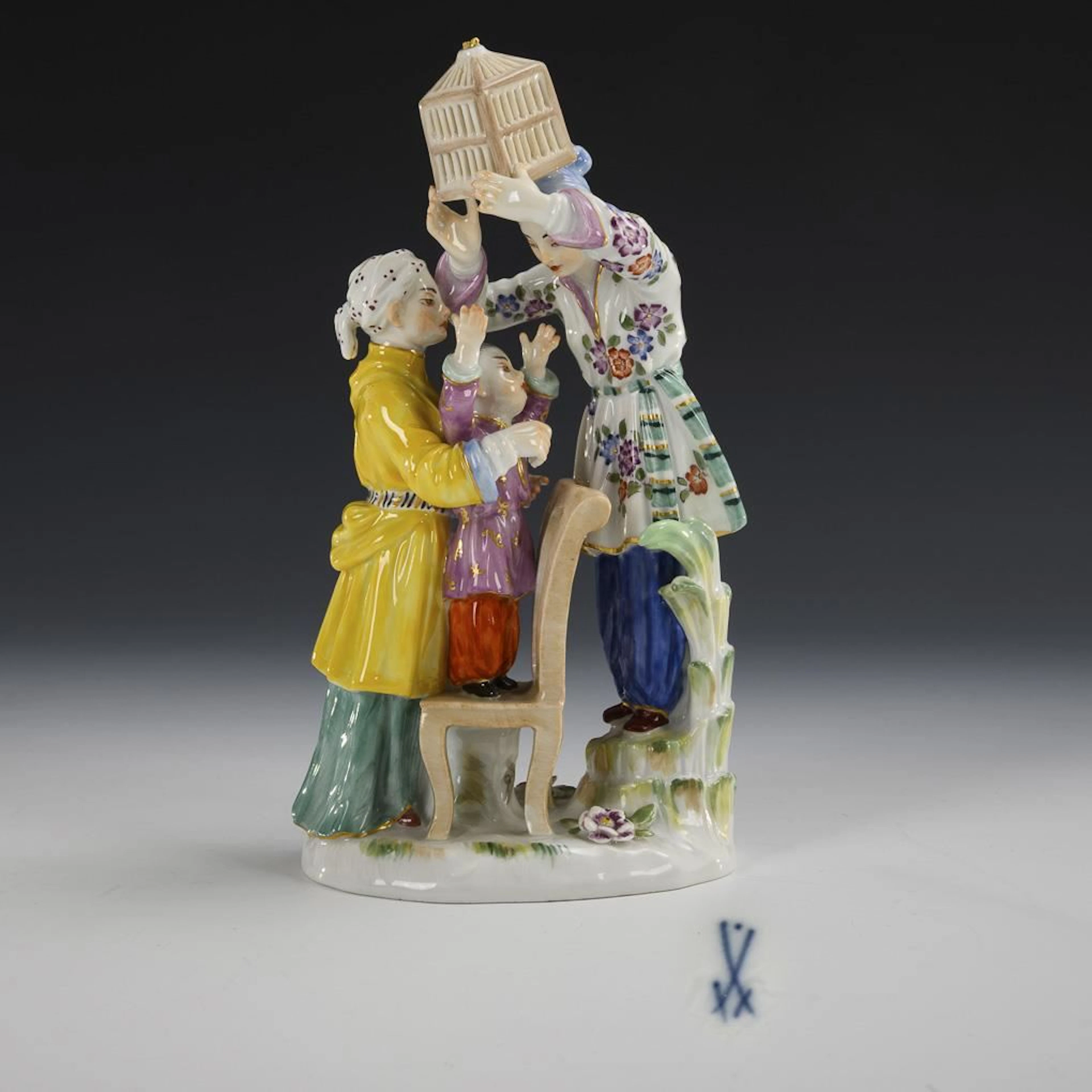 Group of Japanese Figures with a Birdcage. Meissen.