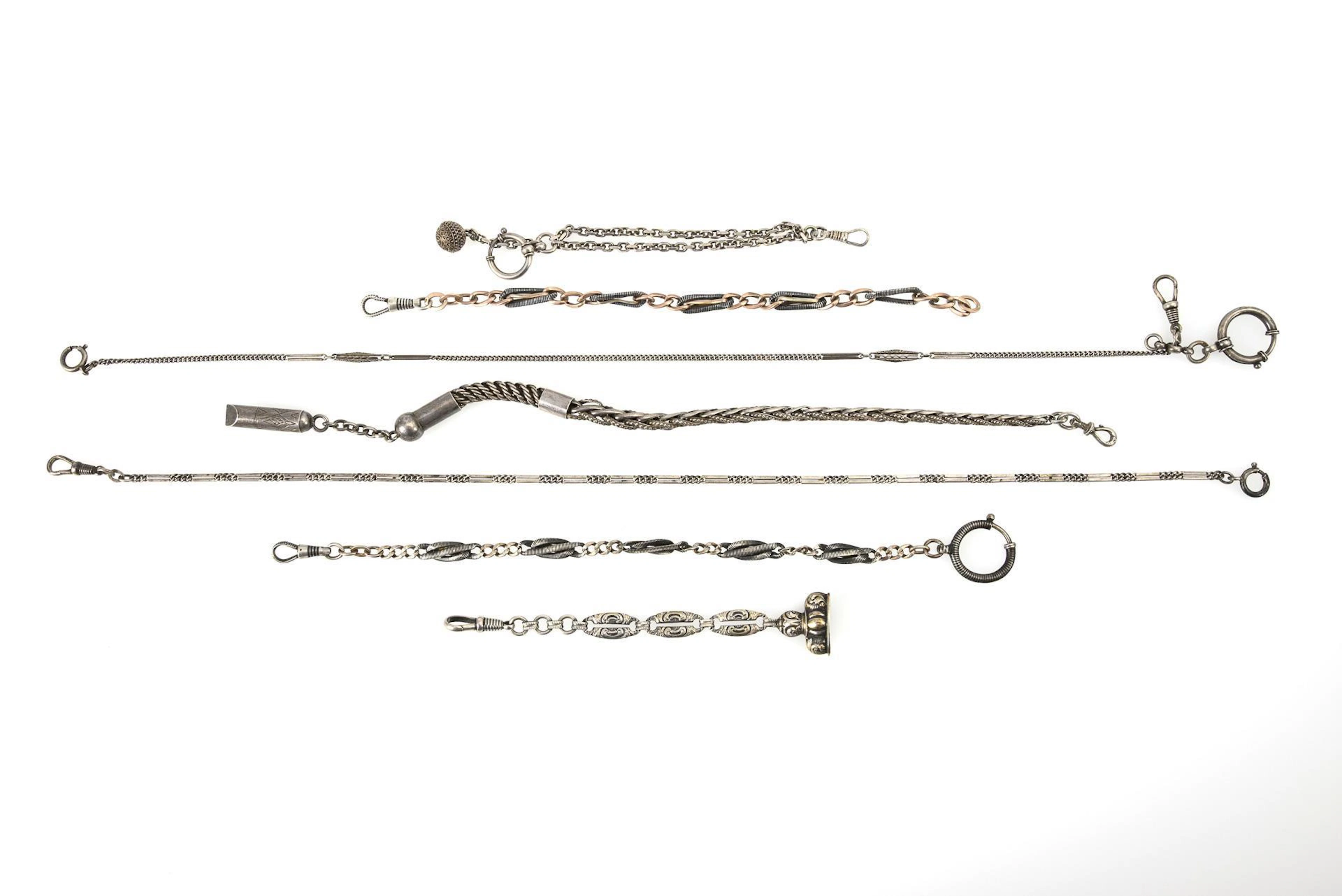 6 silver watch chains.