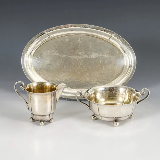 Silver sugar and cream set on a tray. Bruckmann & Söhne, Heilbronn.