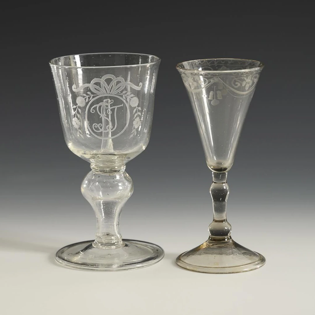 Broken joke glass and goblet.