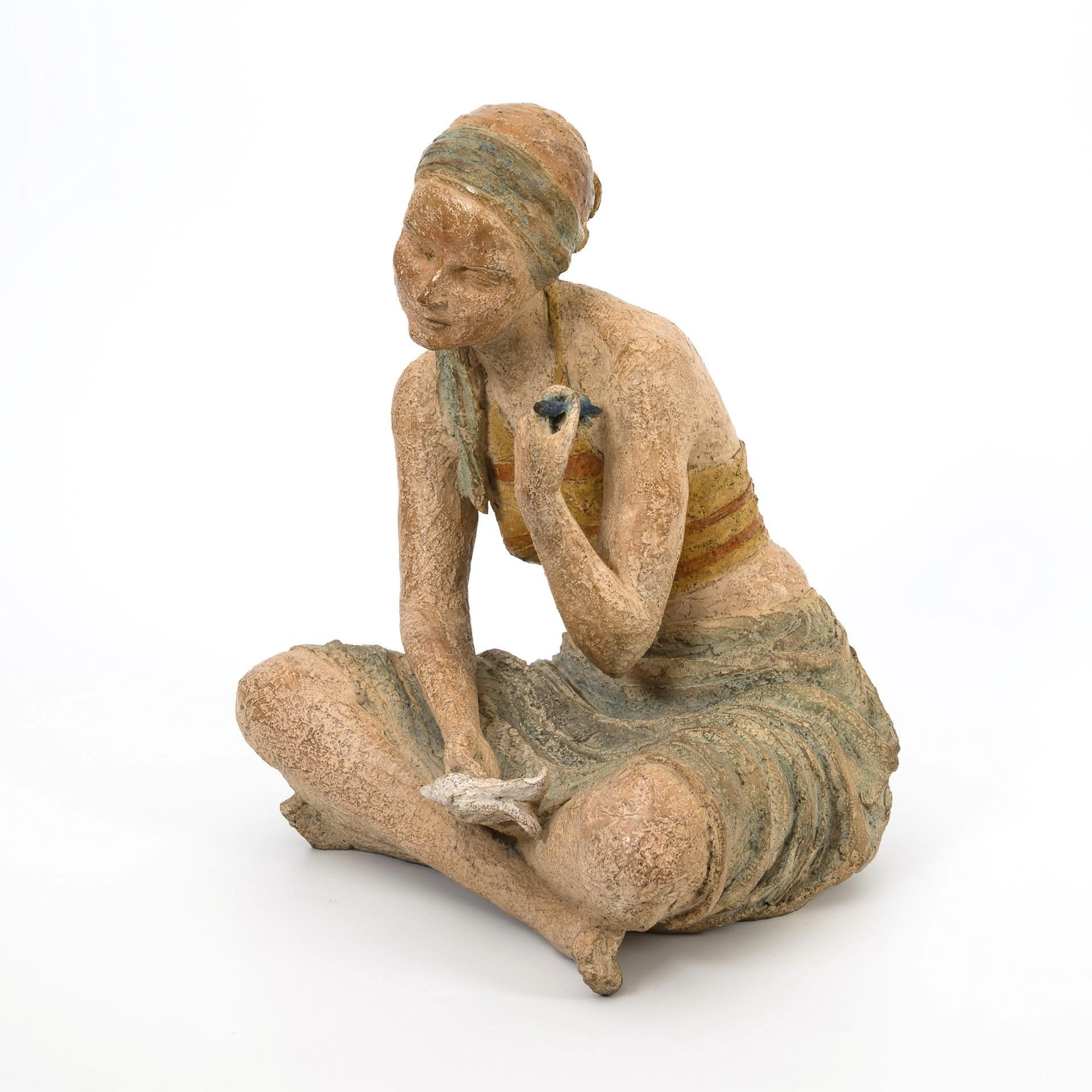 Sitting woman writing