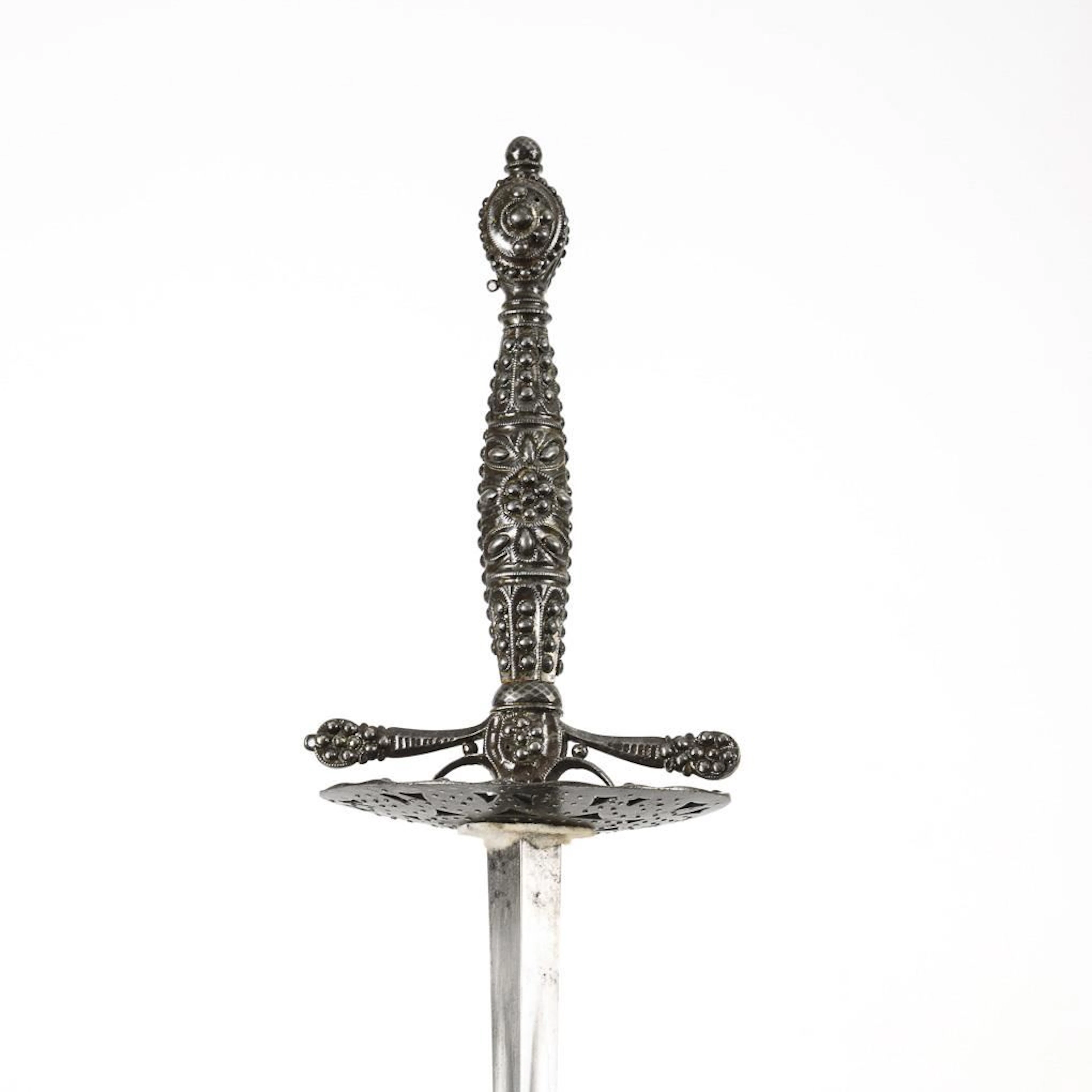 Sword with a triangular blade and a white scabbard.
