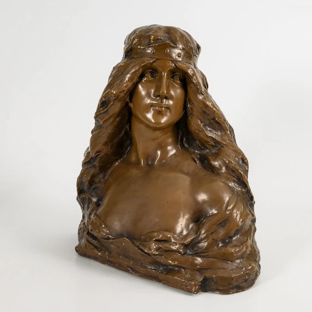 Art Nouveau bust of a woman.