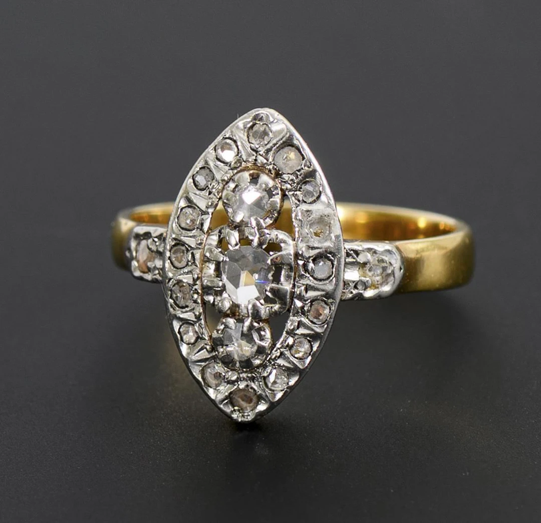 Navette ring with rose-cut diamonds.