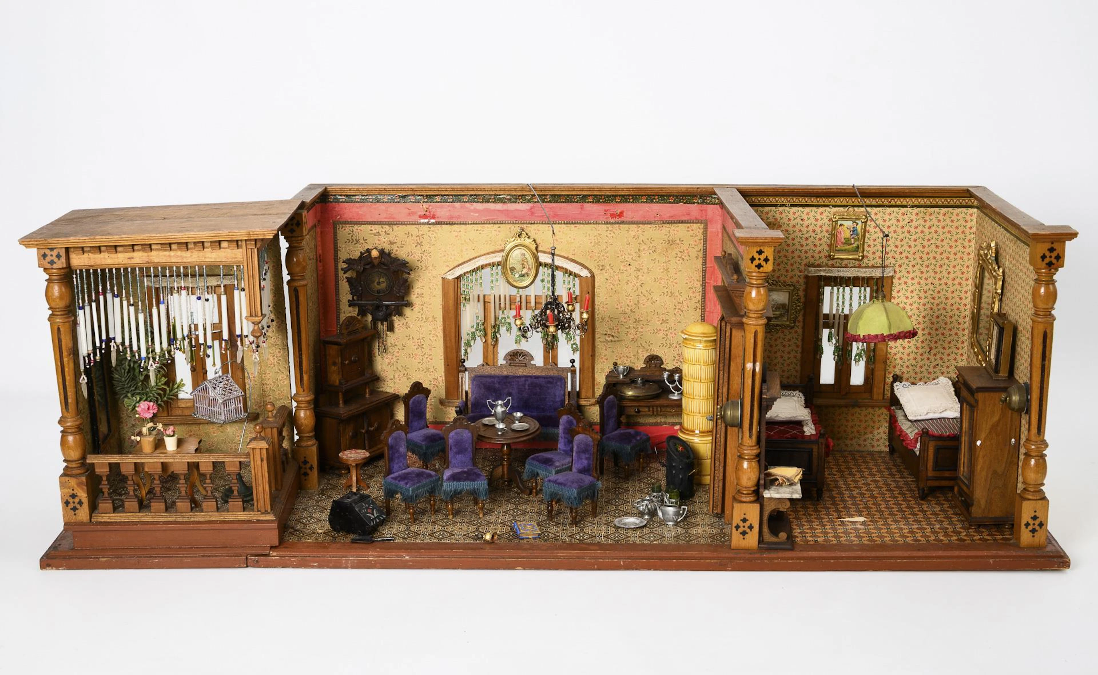 Large doll's house with removable veranda.