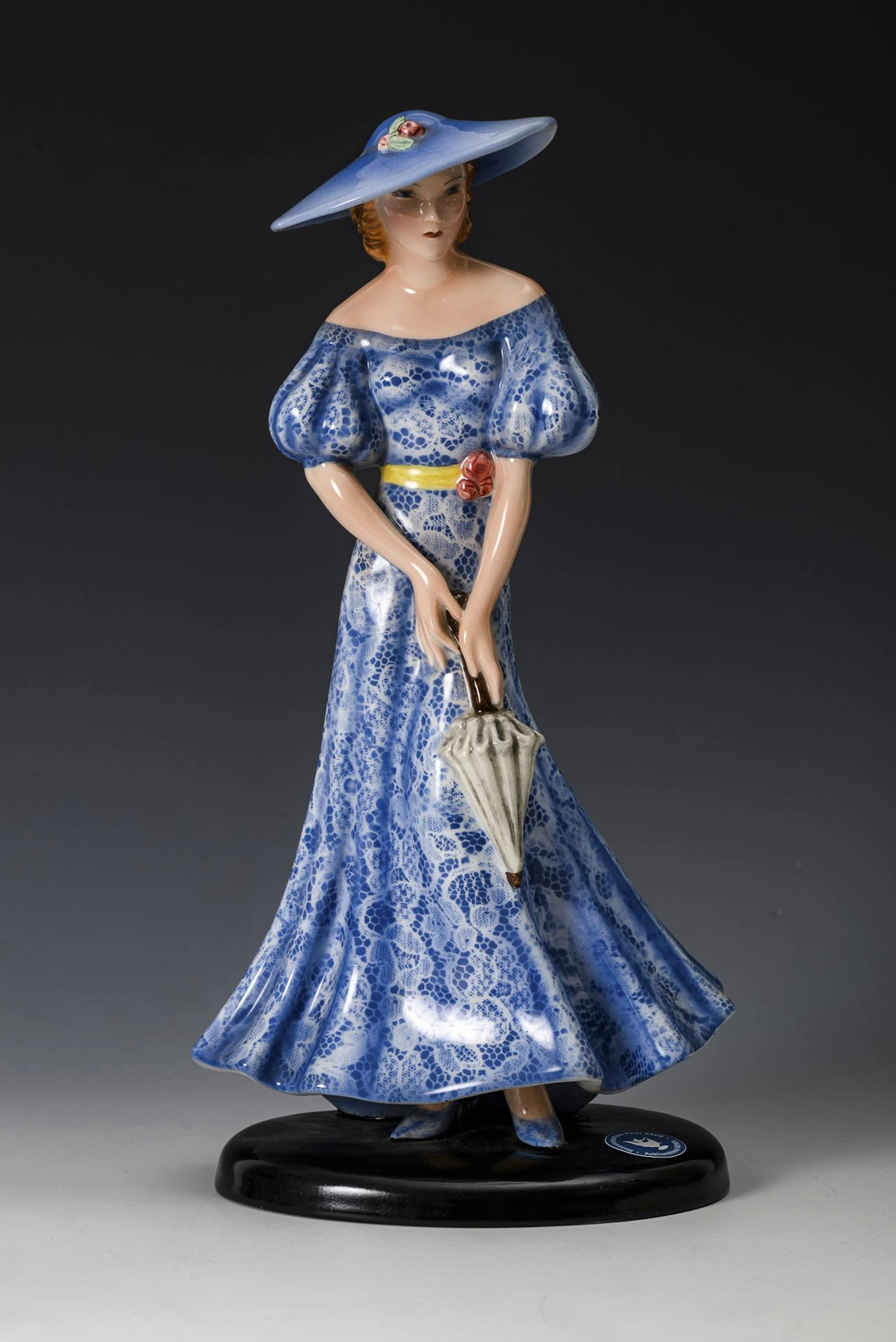 Art deco fashion lady in blue dress. Viennese manufactory Friedrich