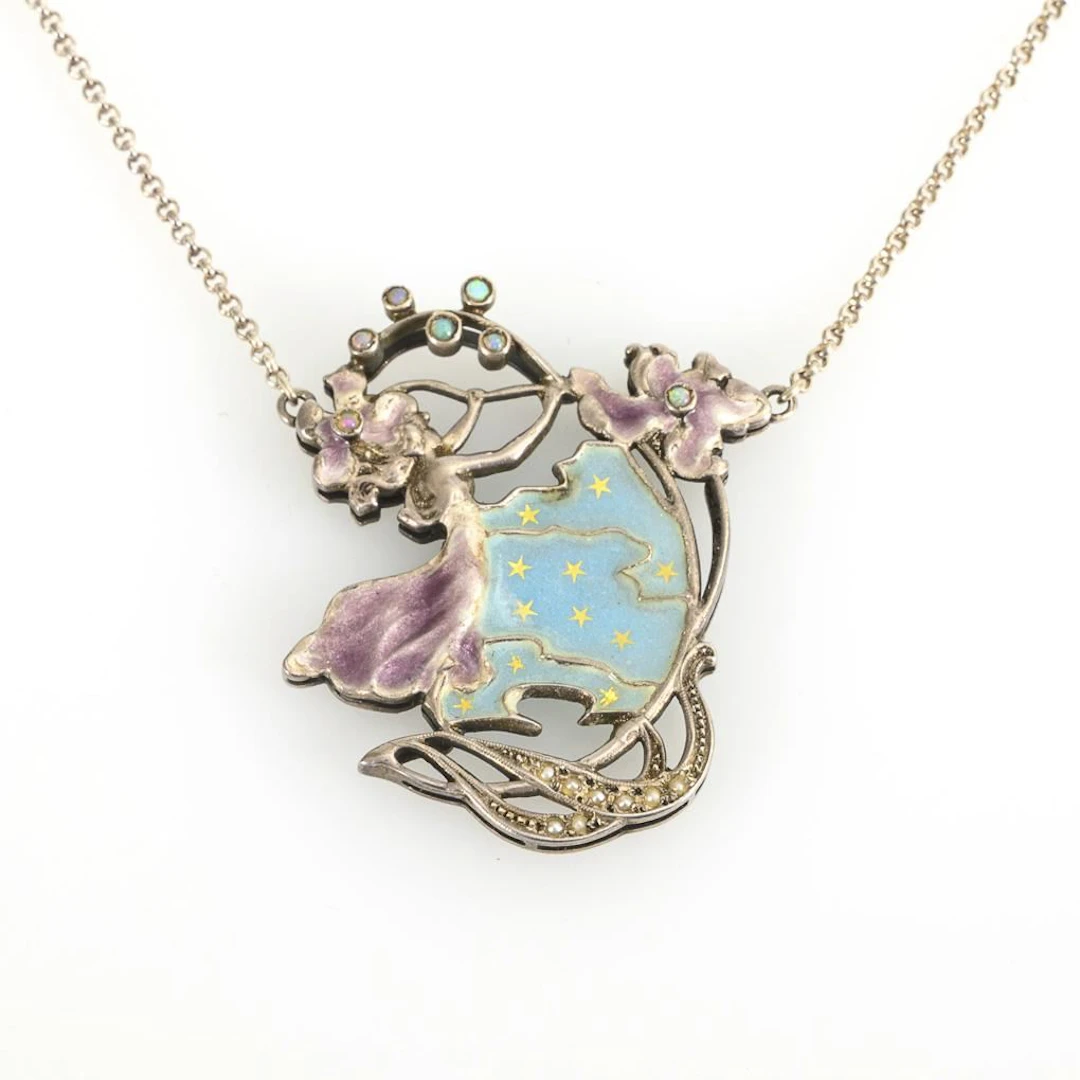 Art Nouveau pendant on a modern chain.