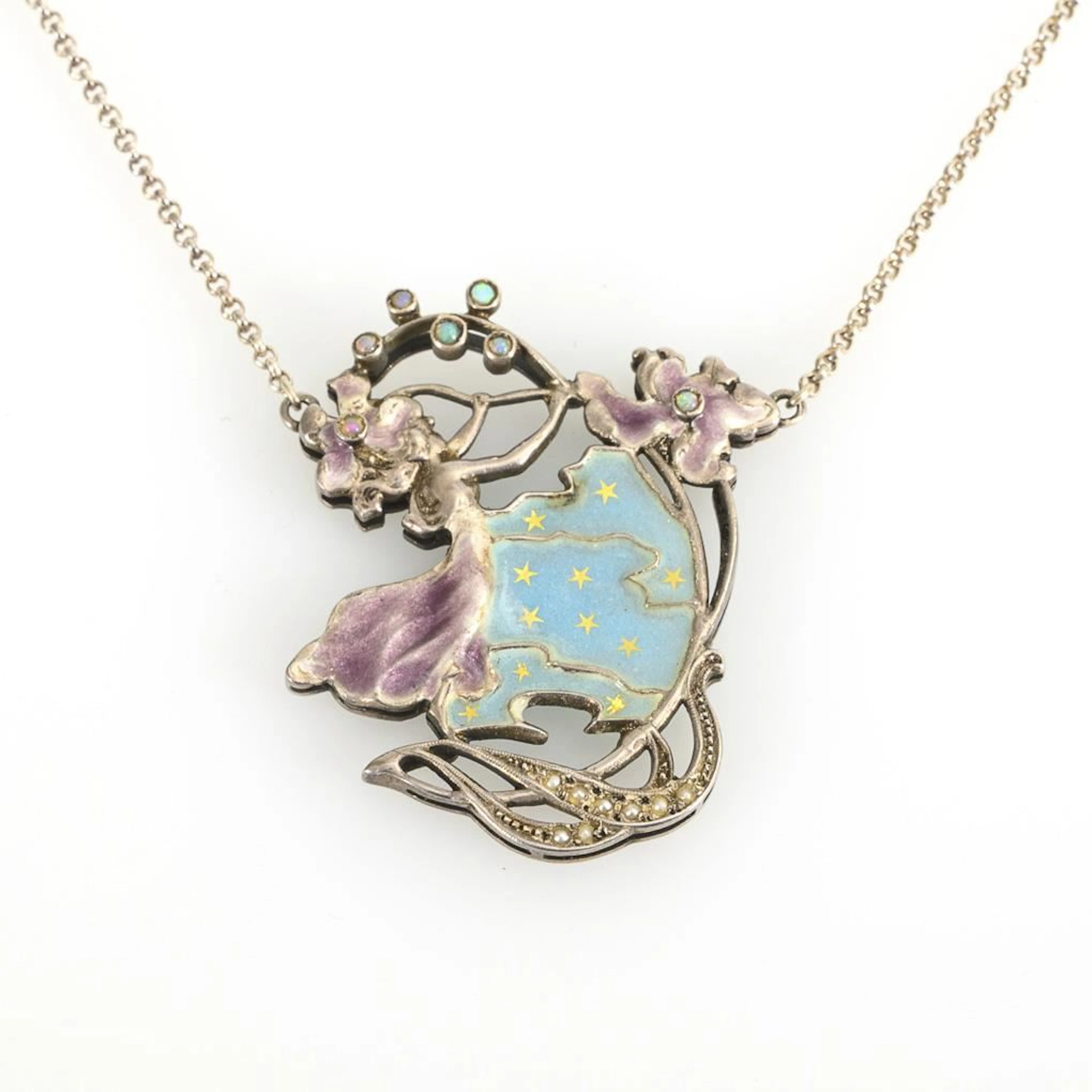 Art Nouveau pendant on a modern chain.