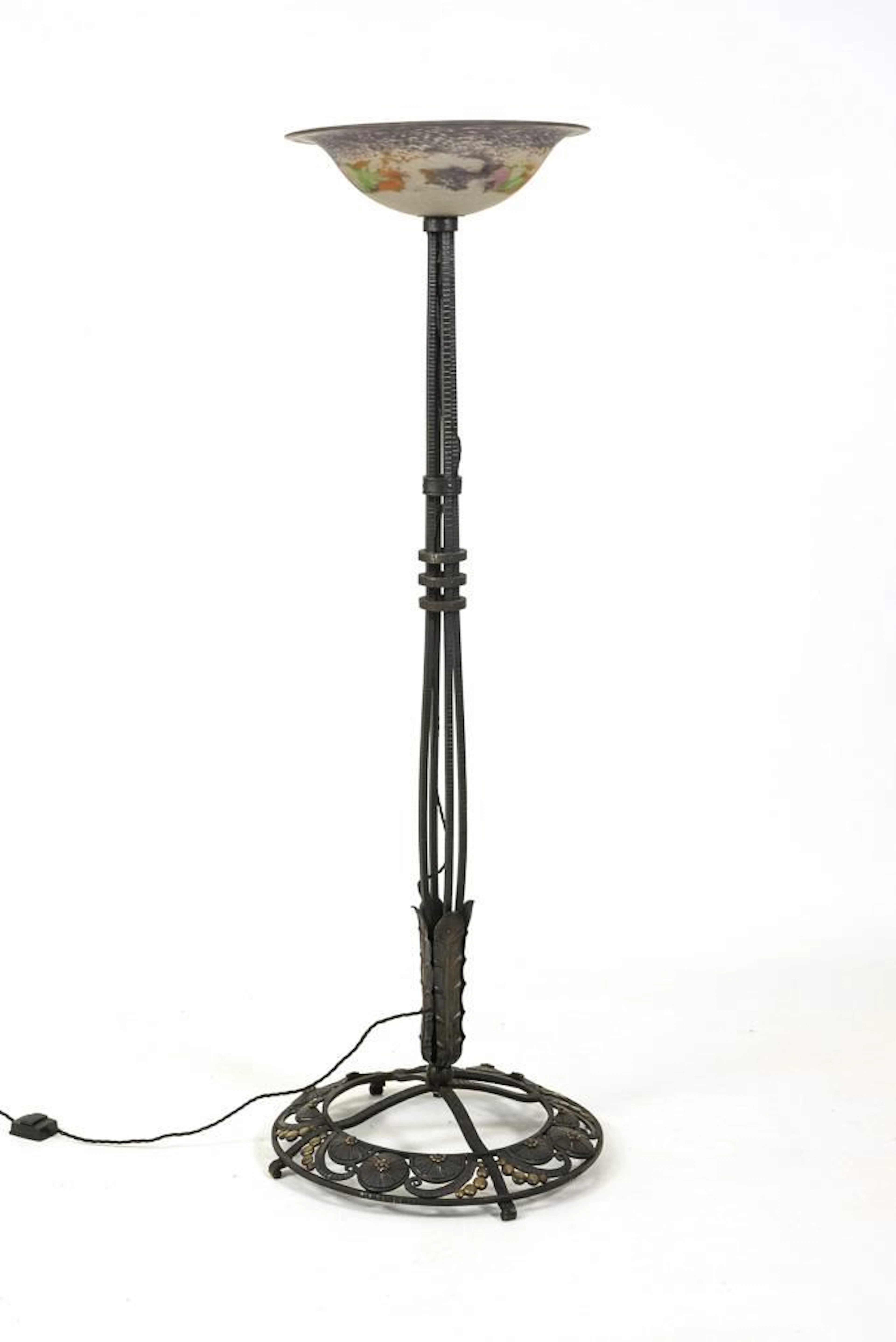 Wrought-iron floor lamp.