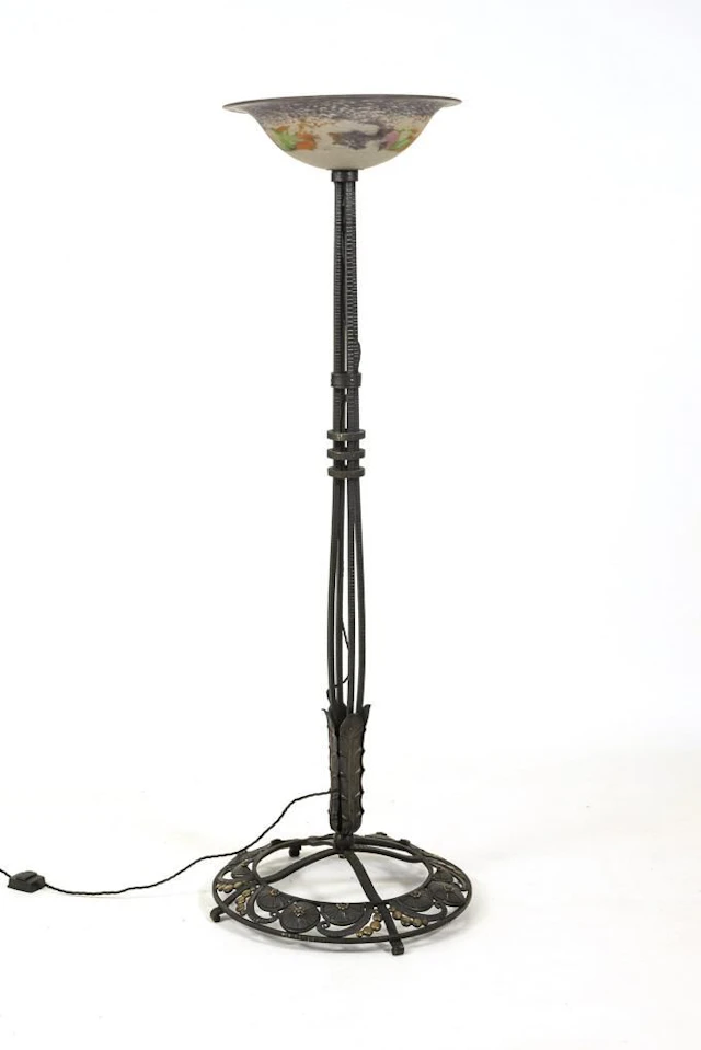 Wrought-iron floor lamp.