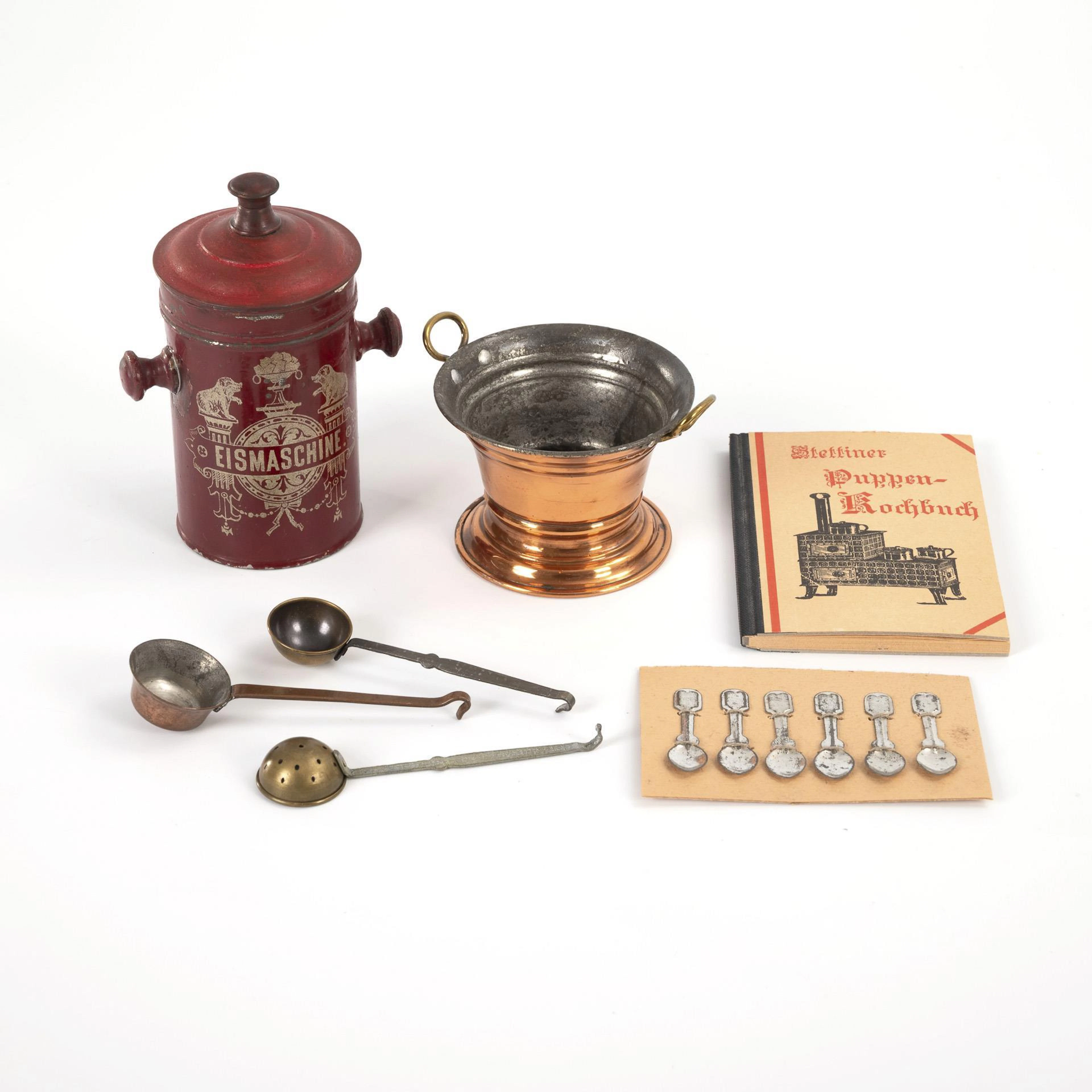 Tin ice cream maker and some doll's kitchen accessories. Bing brothers.
