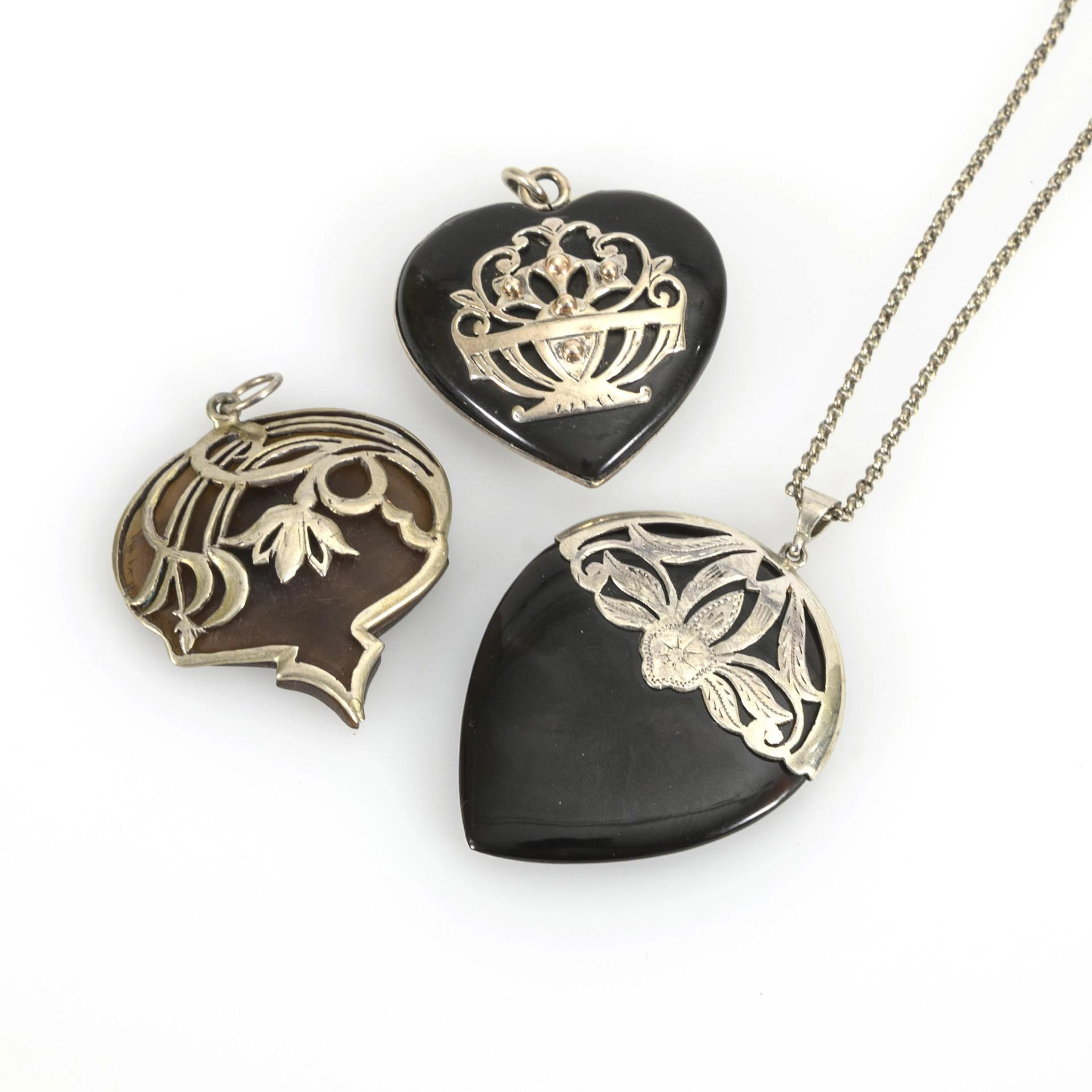 3 pieces of Art Nouveau horn jewelry.