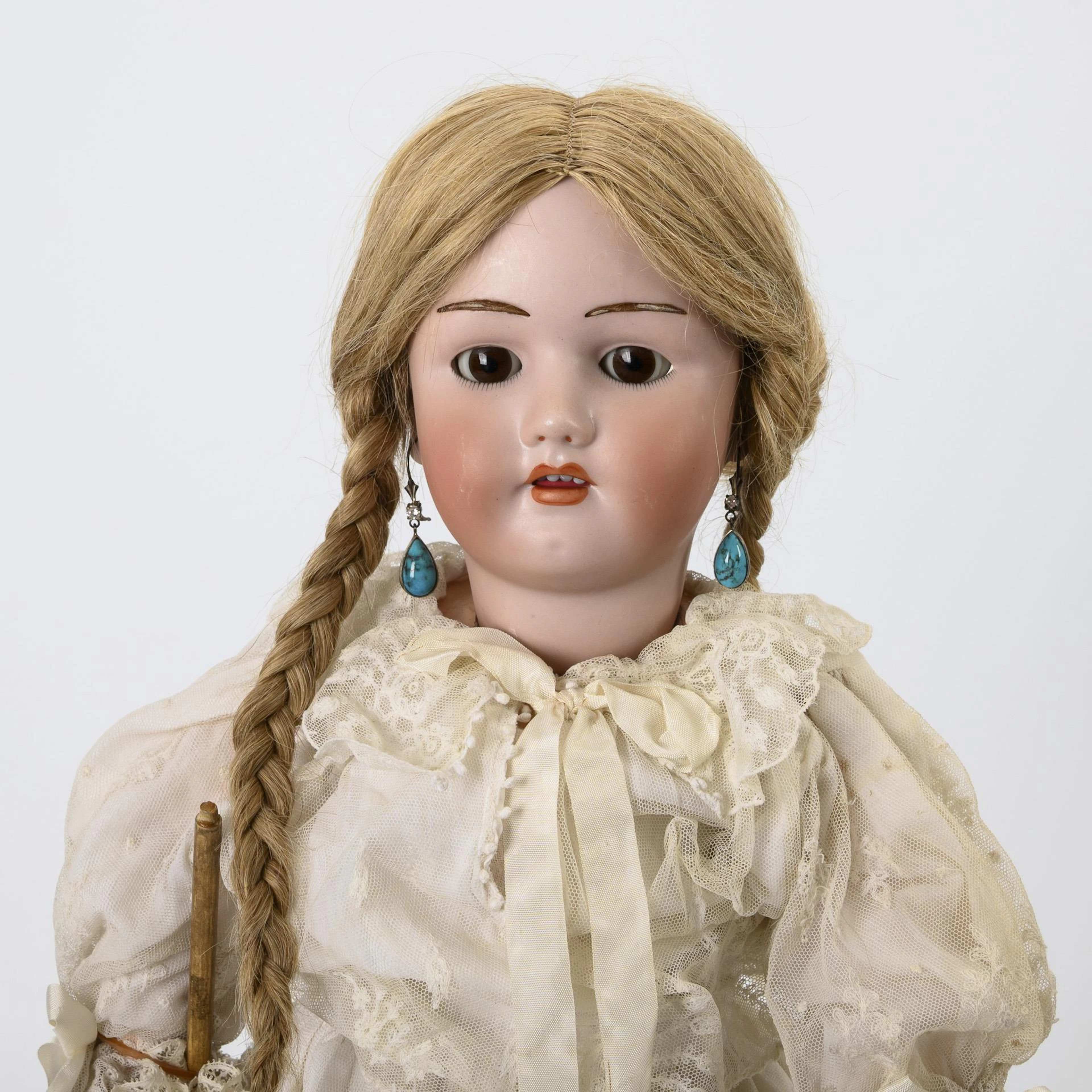 Doll girl with fur eyebrows. Heinrich Handwerck.