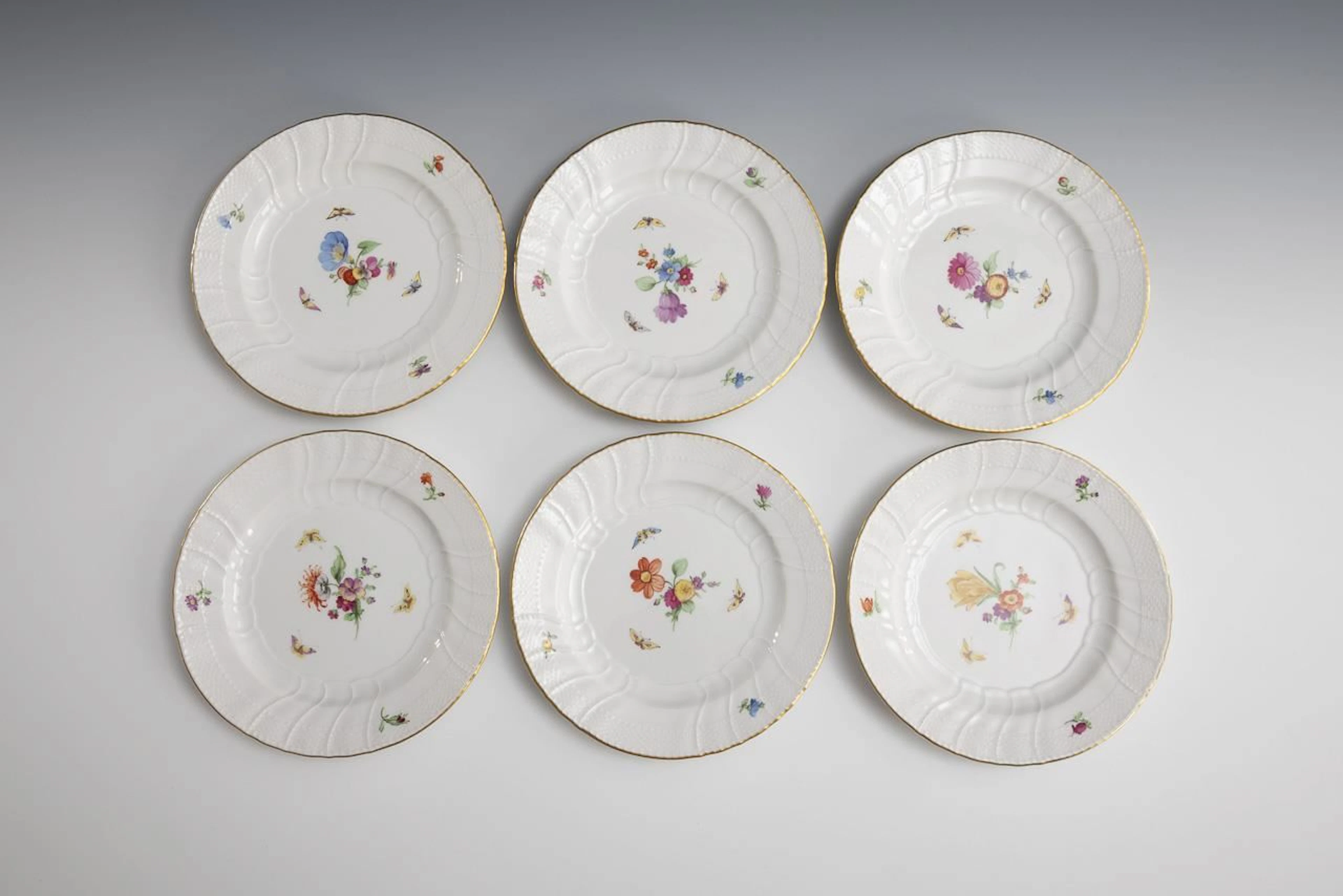 6 plates with floral and insect motifs. KPM Berlin.