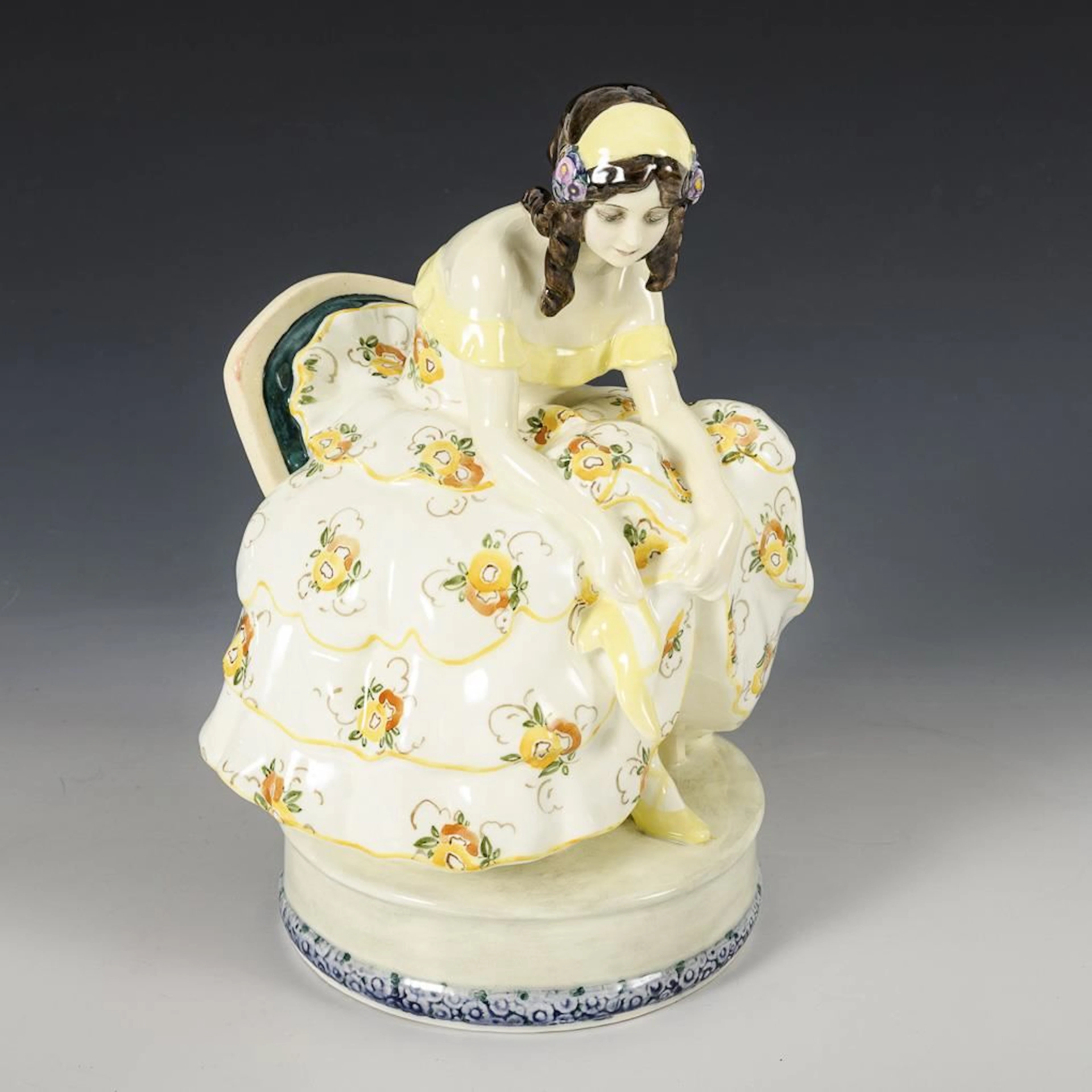 Figure: "Seated Dancer Tying Her Shoes". Vienna-based manufacturer