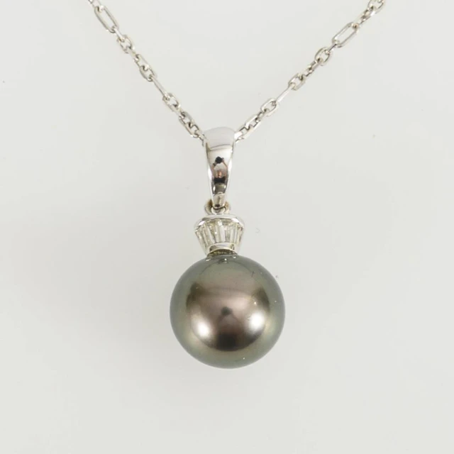 Pendant with diamonds and a dark pearl on a chain.