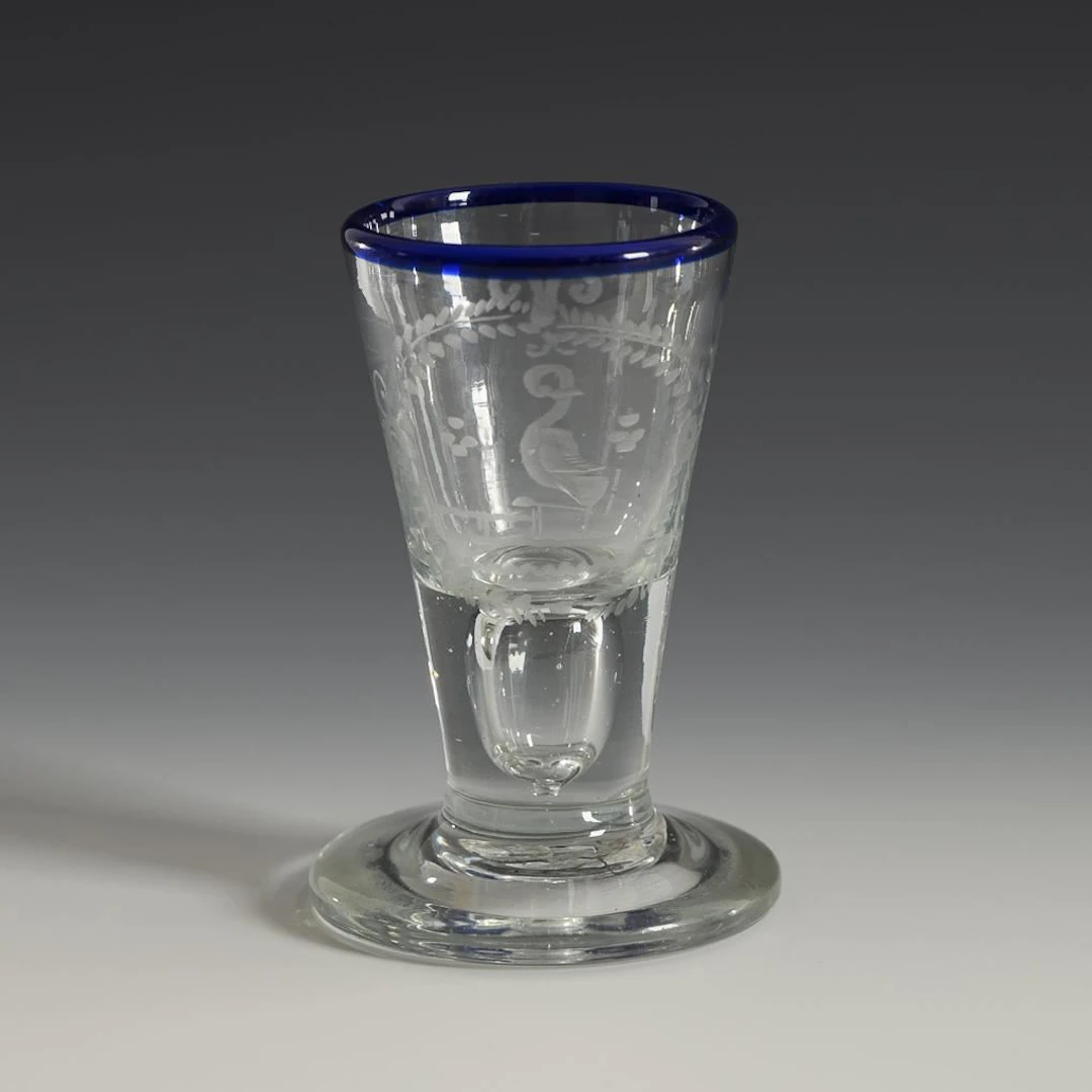 Baroque shot glass with a blue rim. Lauenstein.