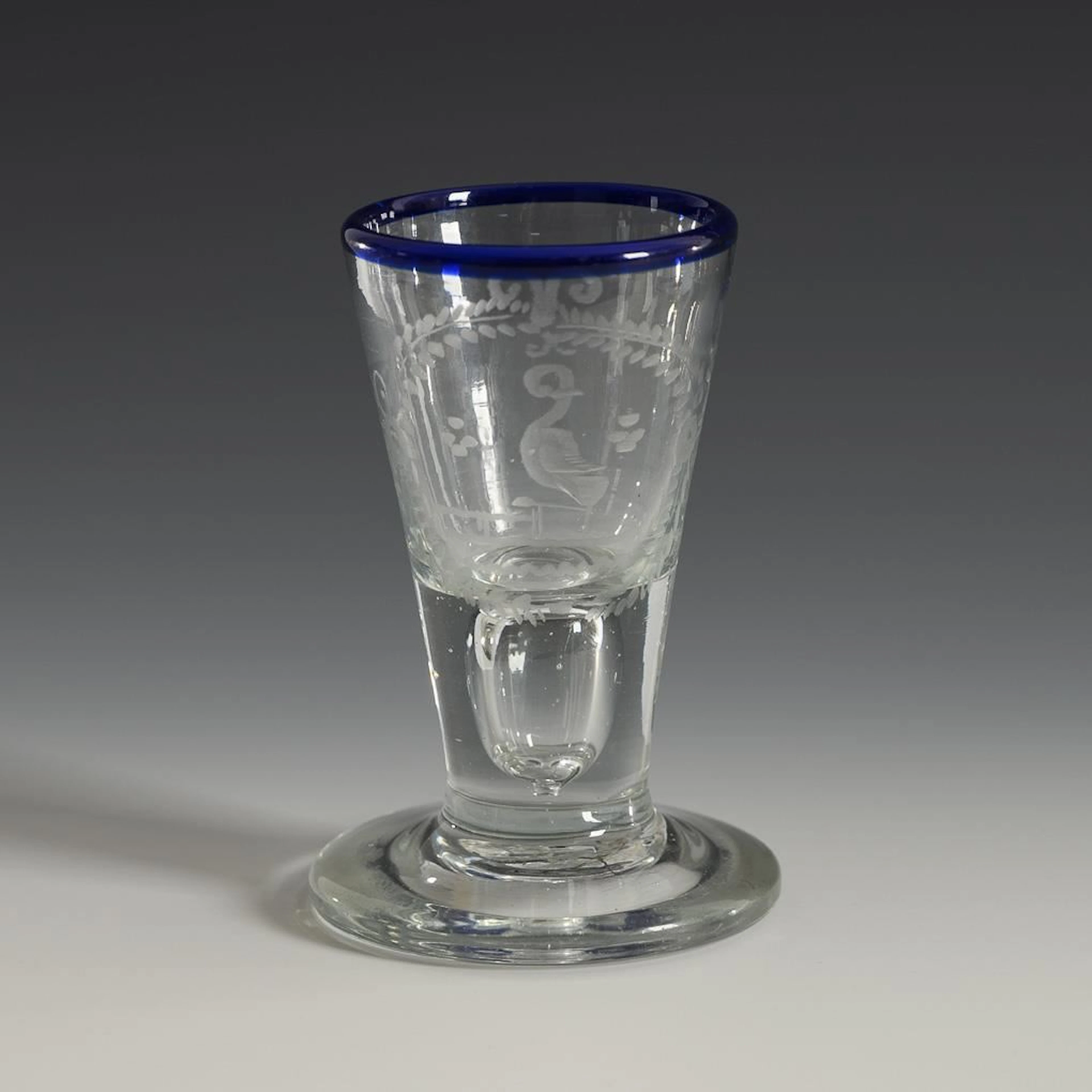 Baroque shot glass with a blue rim. Lauenstein.