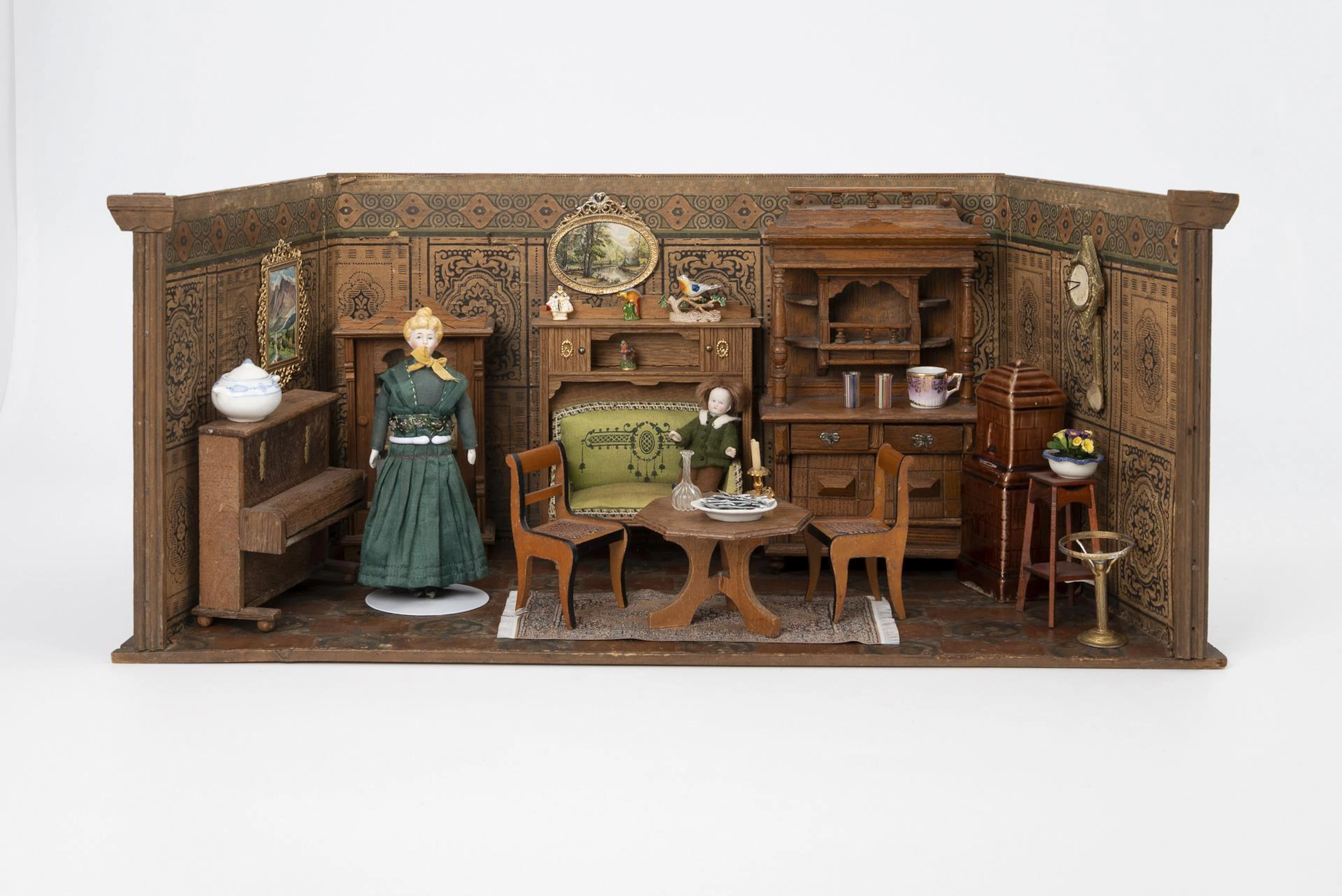 Gründerzeit style doll's house with oak furniture.