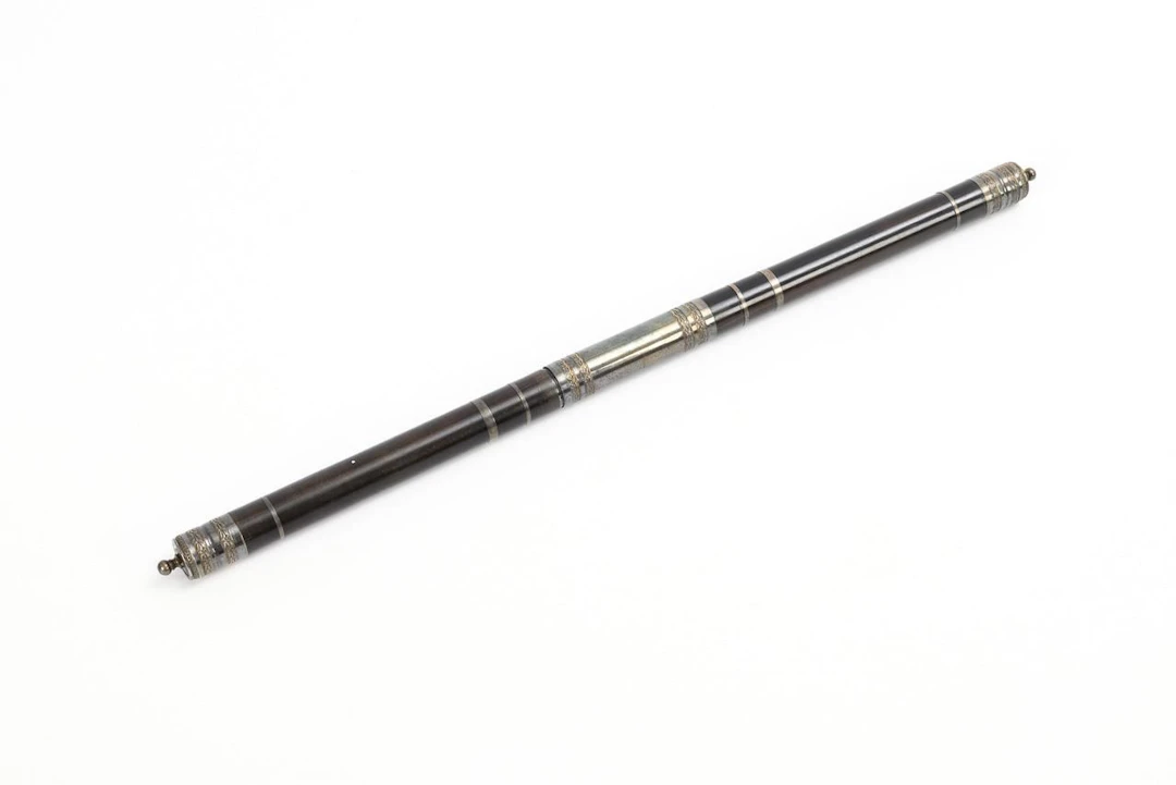 Conductor's baton in a case.