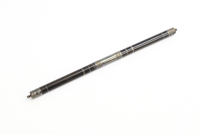 Conductor's baton in a case.
