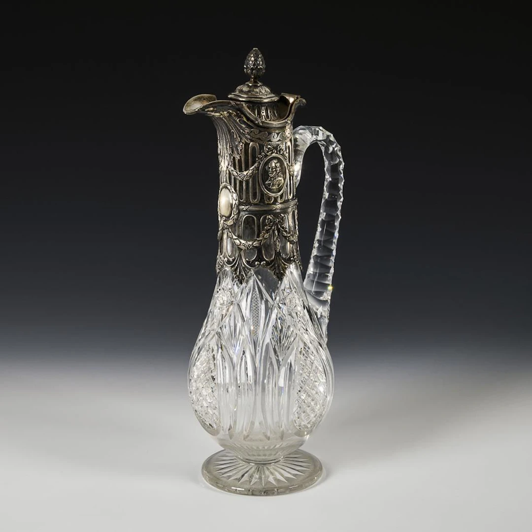 Pitcher with silver mountings.