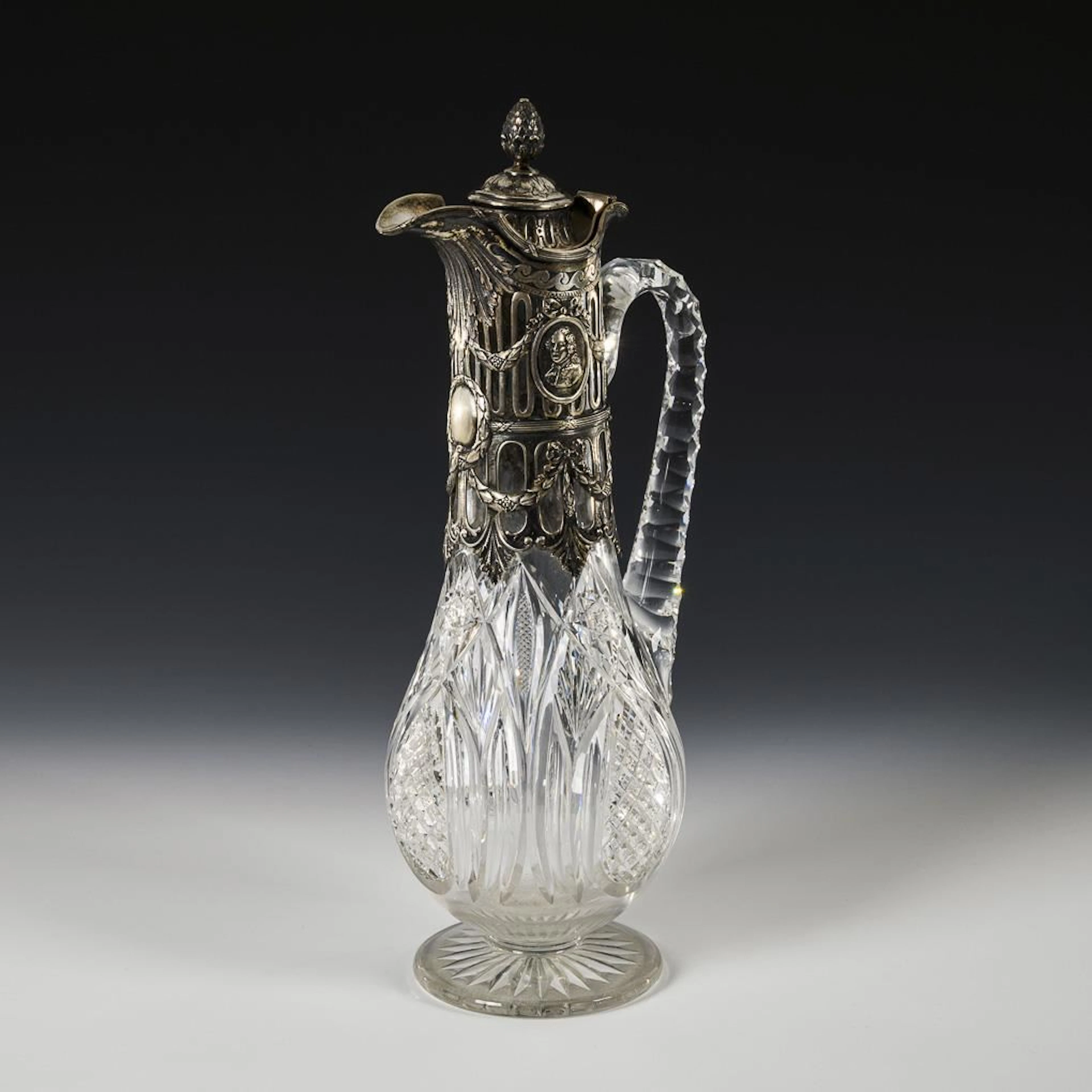 Pitcher with silver mountings.