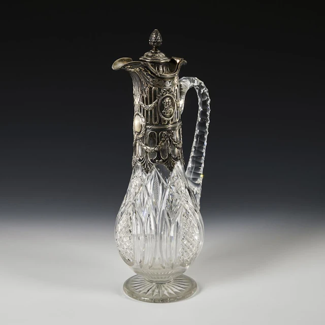 Pitcher with silver mountings.