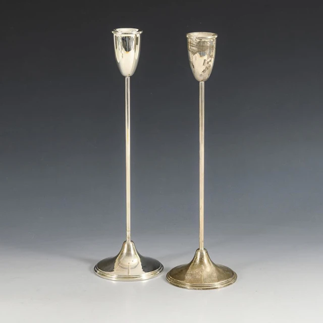 Pair of silver tulip candlesticks.