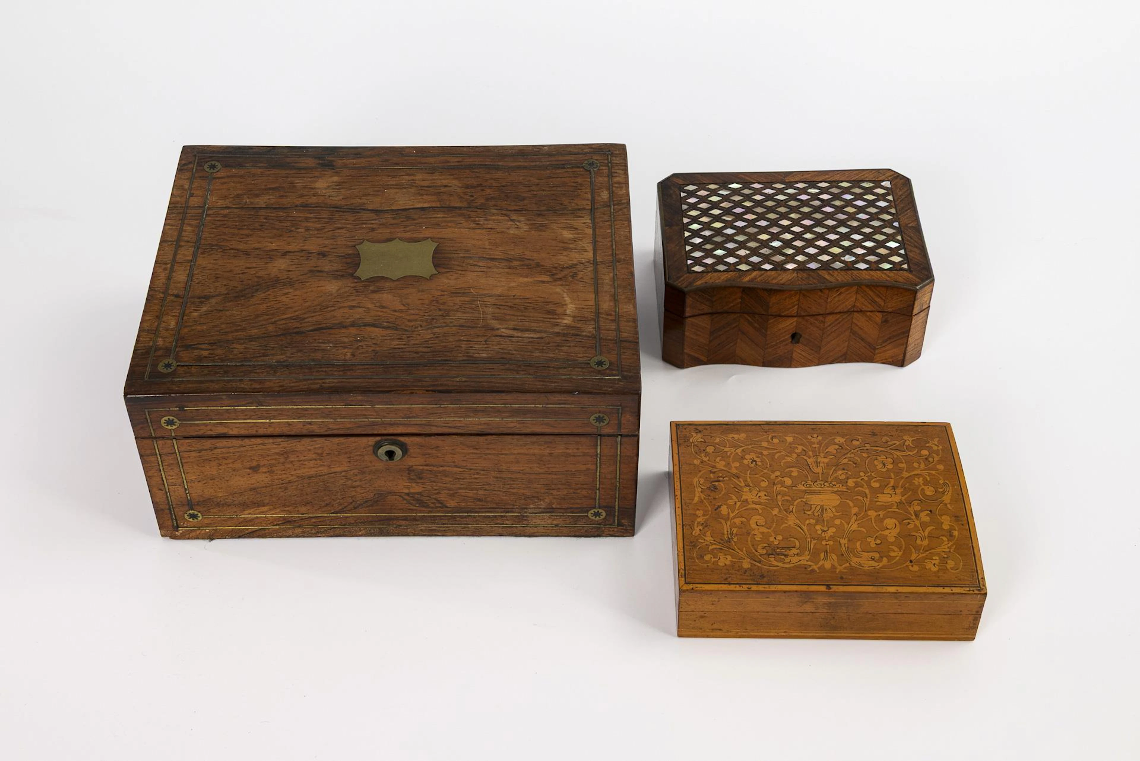 3 wooden caskets.