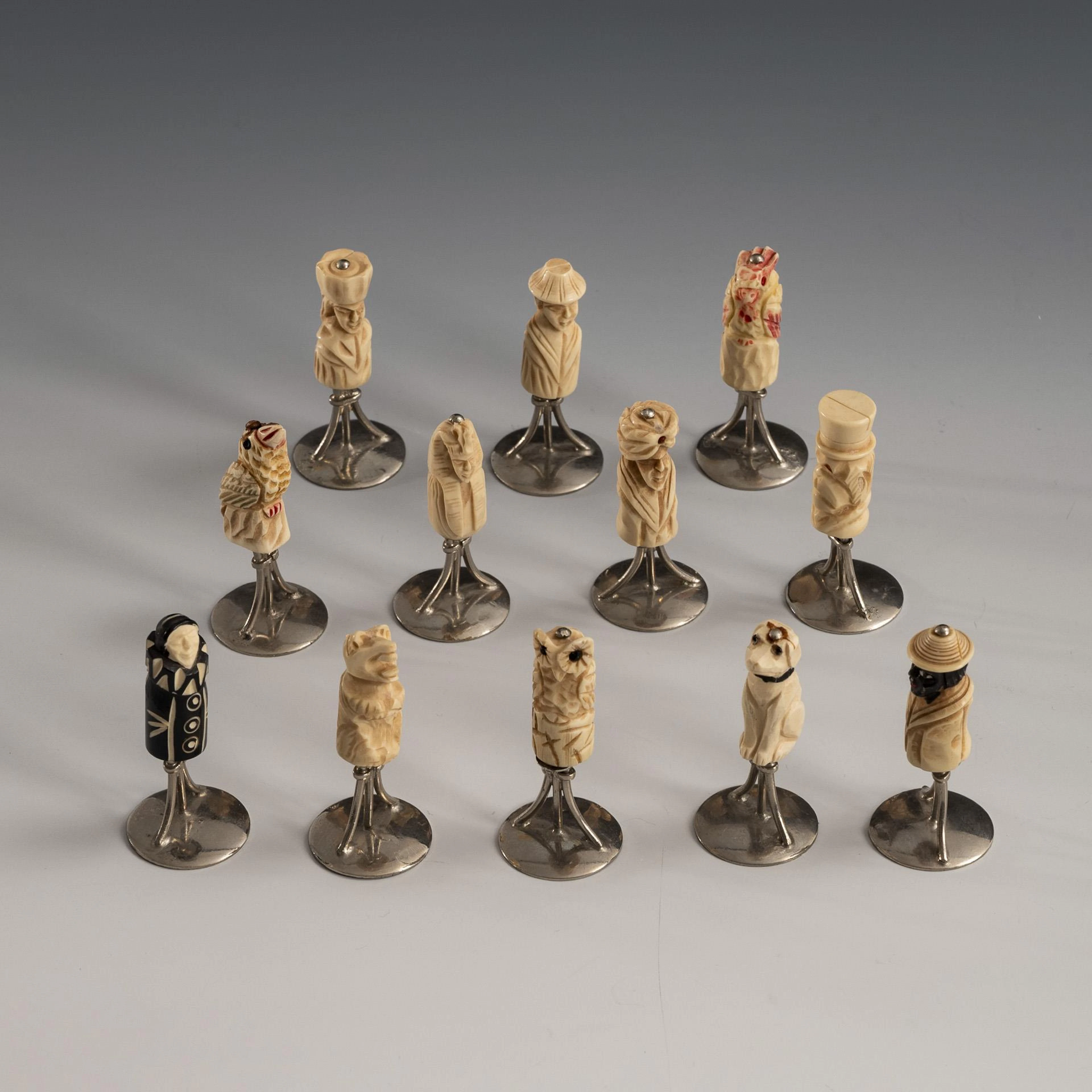 12 figural place card holders.