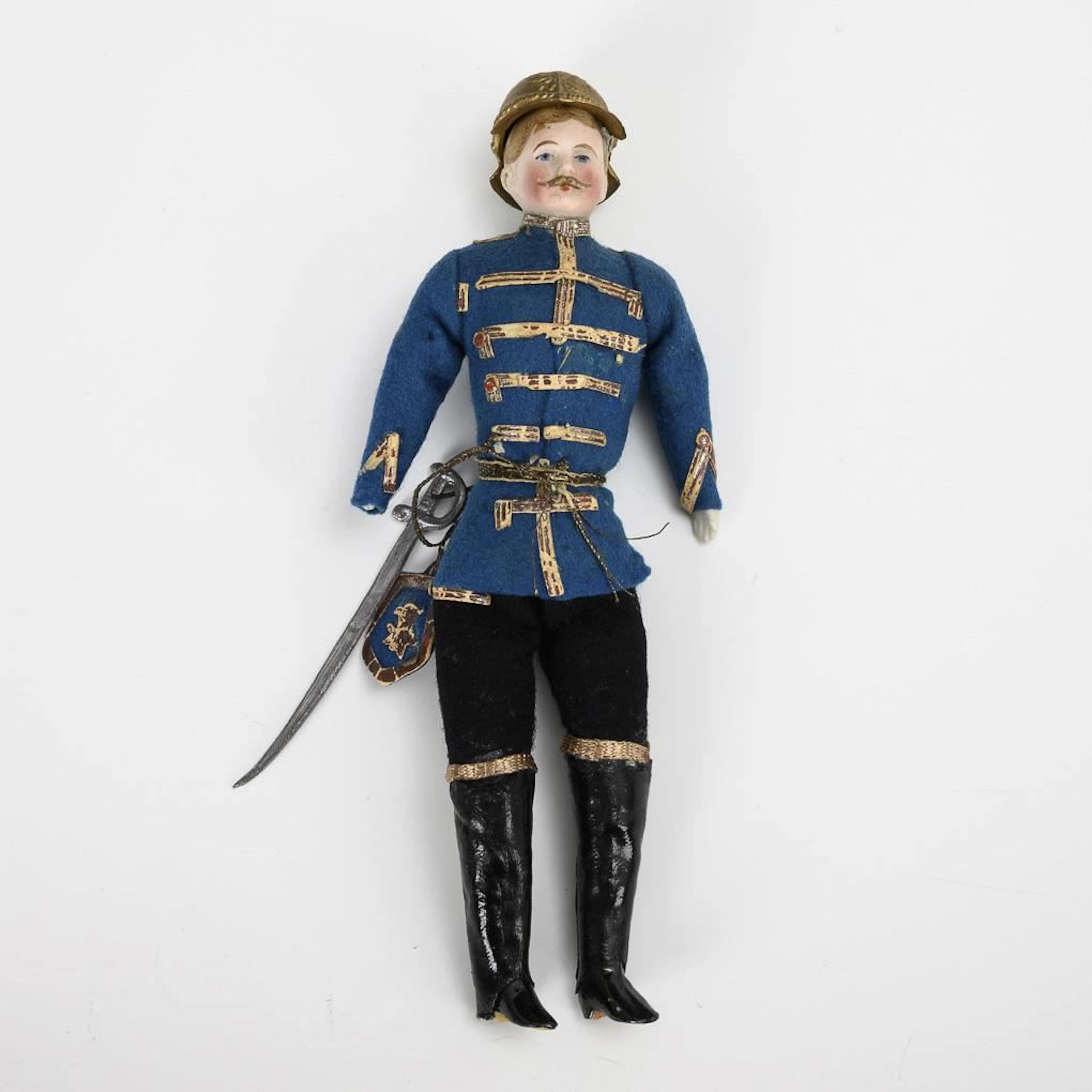Rare dollhouse soldier with a spiked helmet.