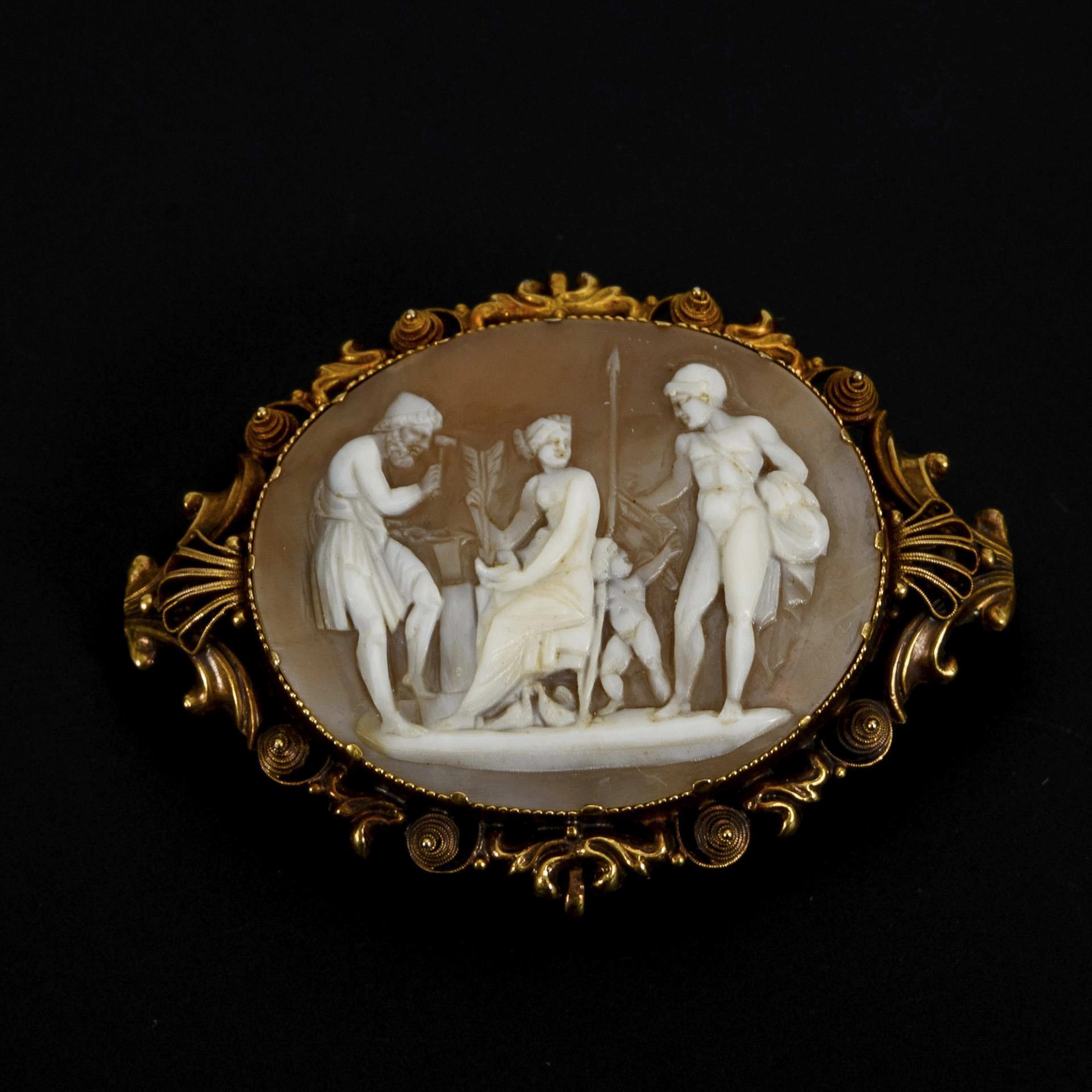 Cameo brooch with mythological scene.