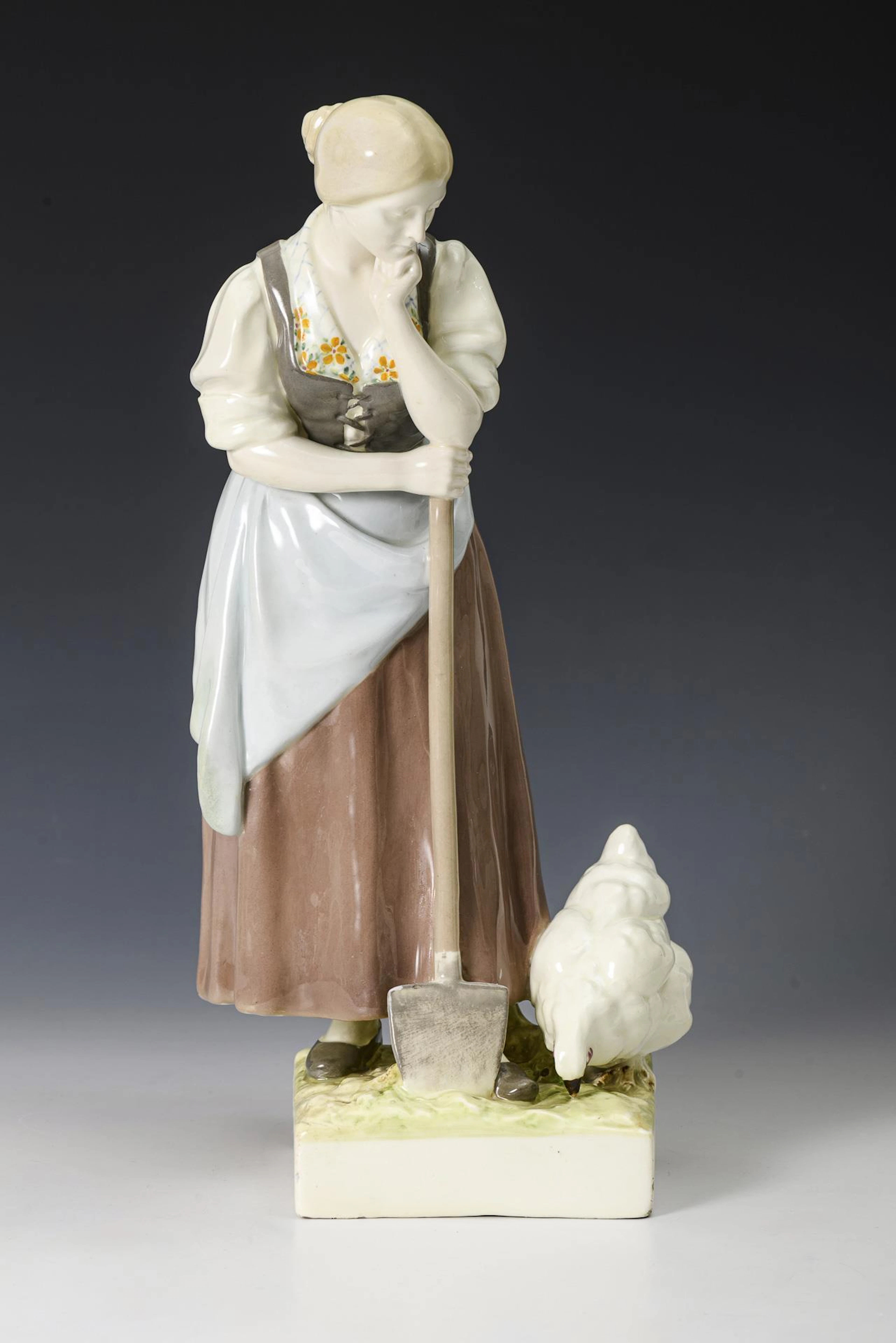 Art Nouveau figurine "Farmer's wife with shovel and chicken". Viennese