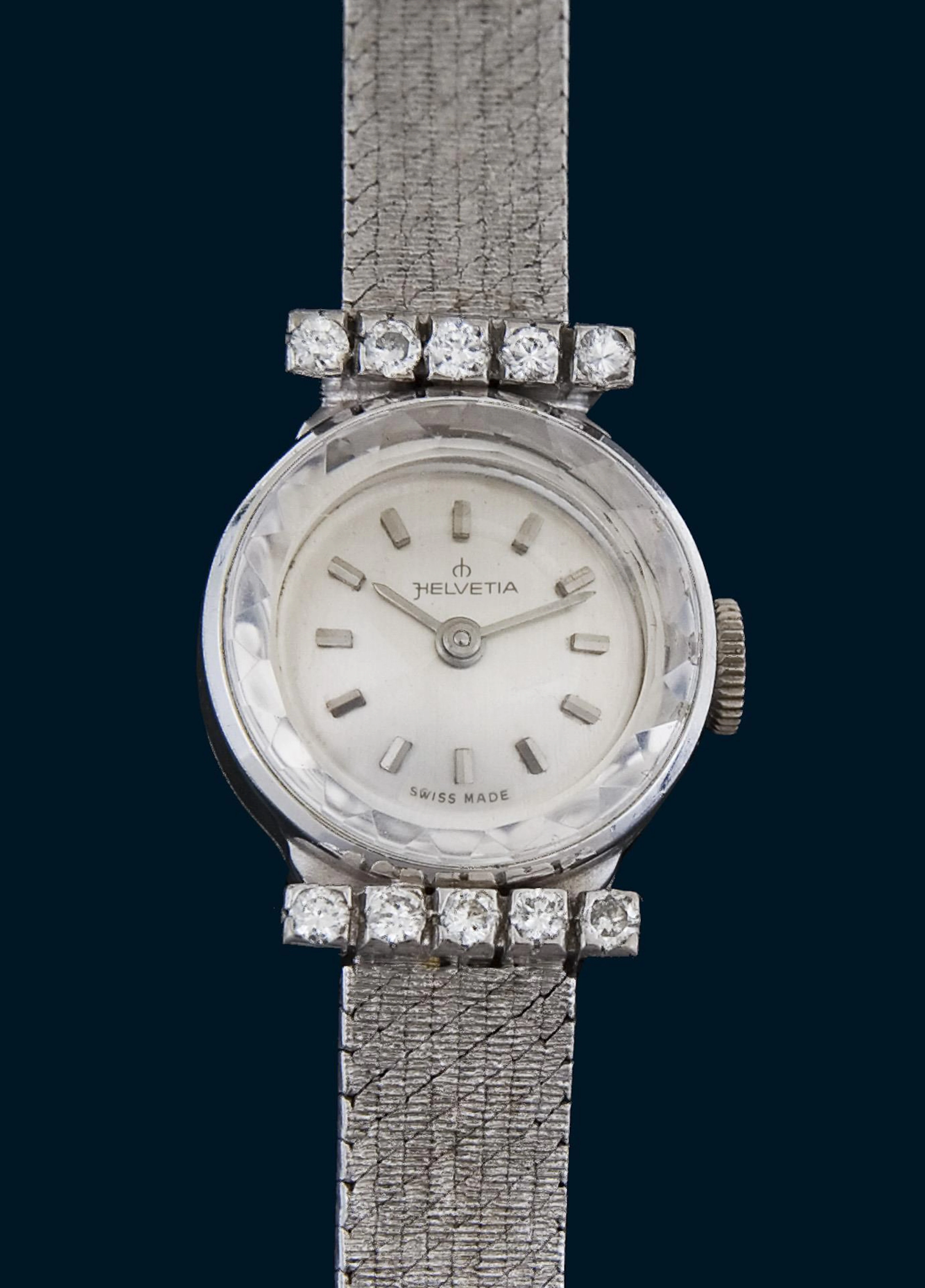 Gold wristwatch with diamonds. Helvetia, Switzerland.