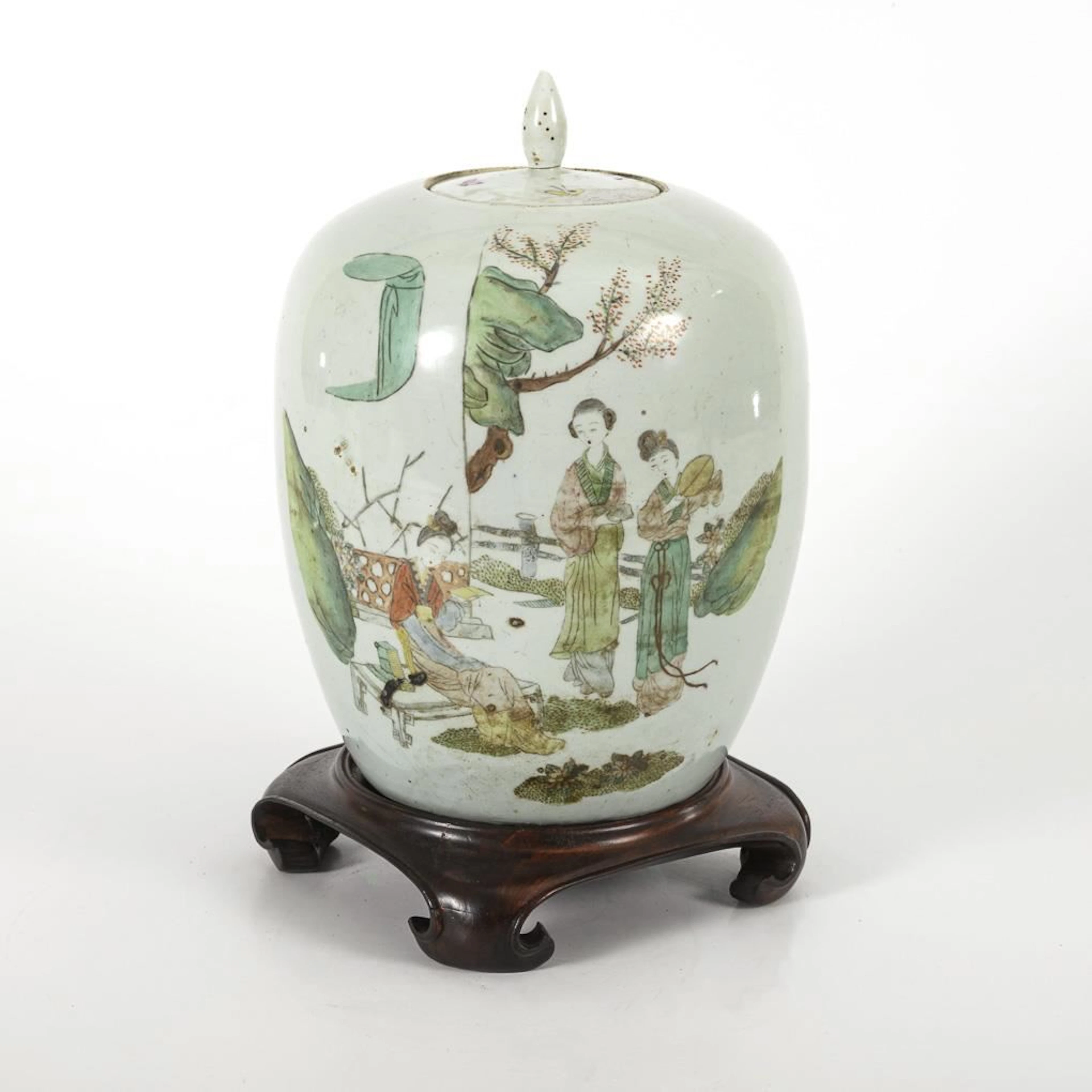 Lidded vase with base.
