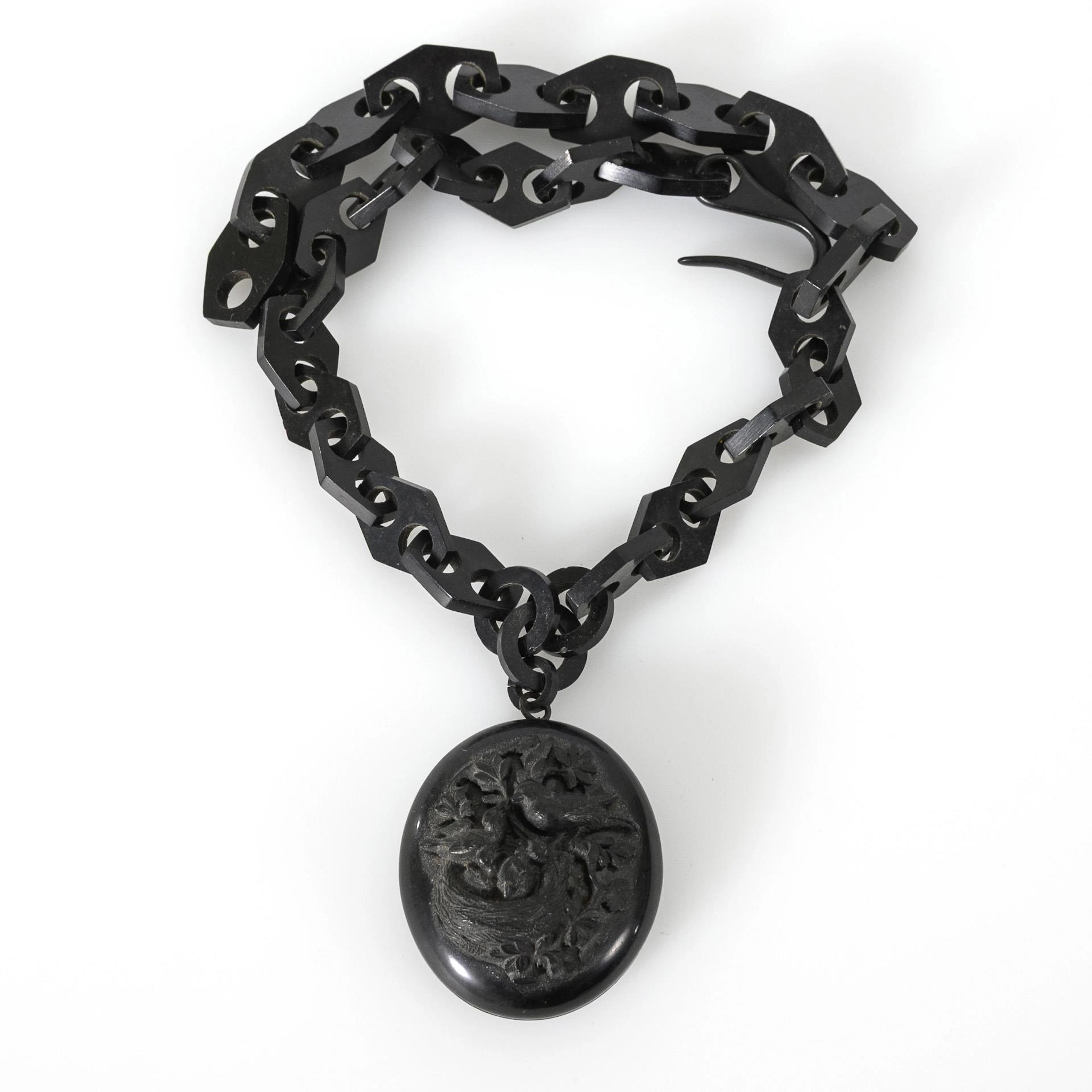 Necklace with medallion pendant.