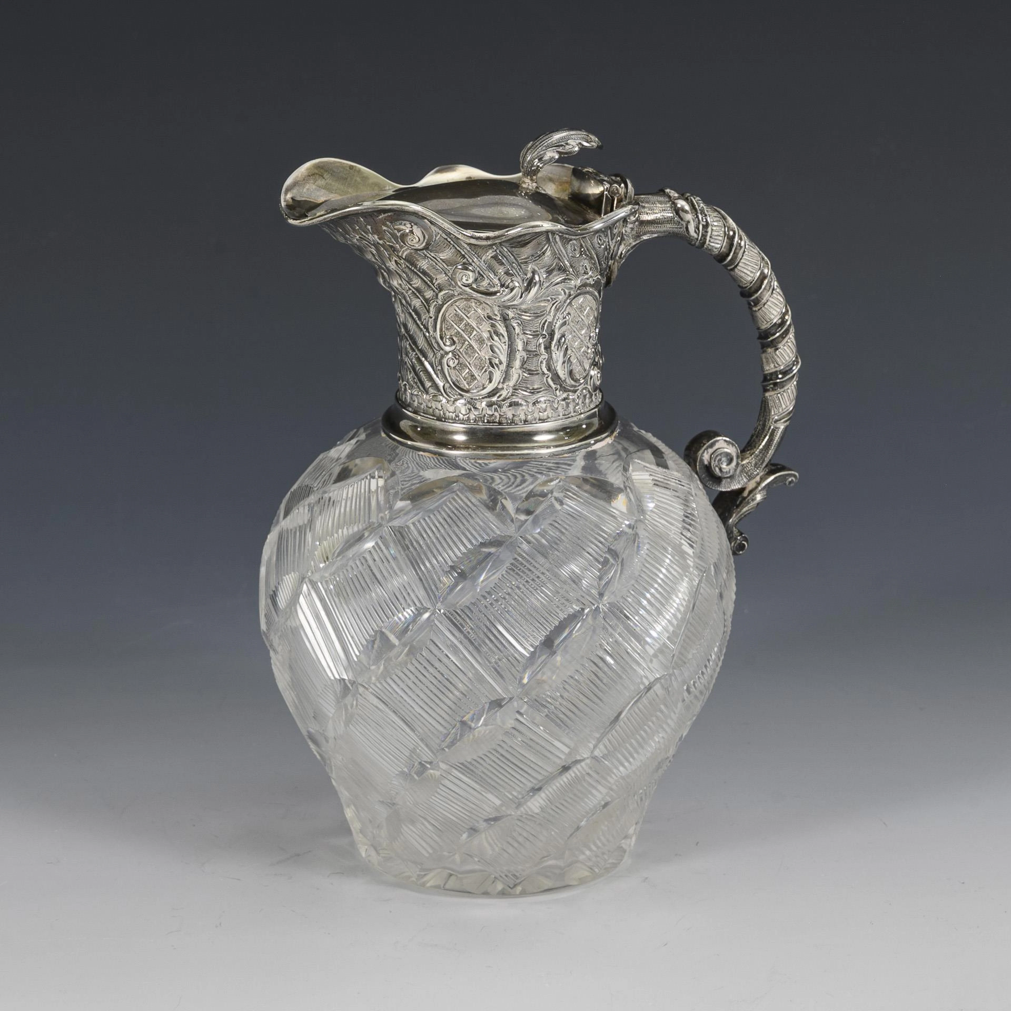 Victorian glass jug with silver mount. John Grinsell & Sons, Birmingham.