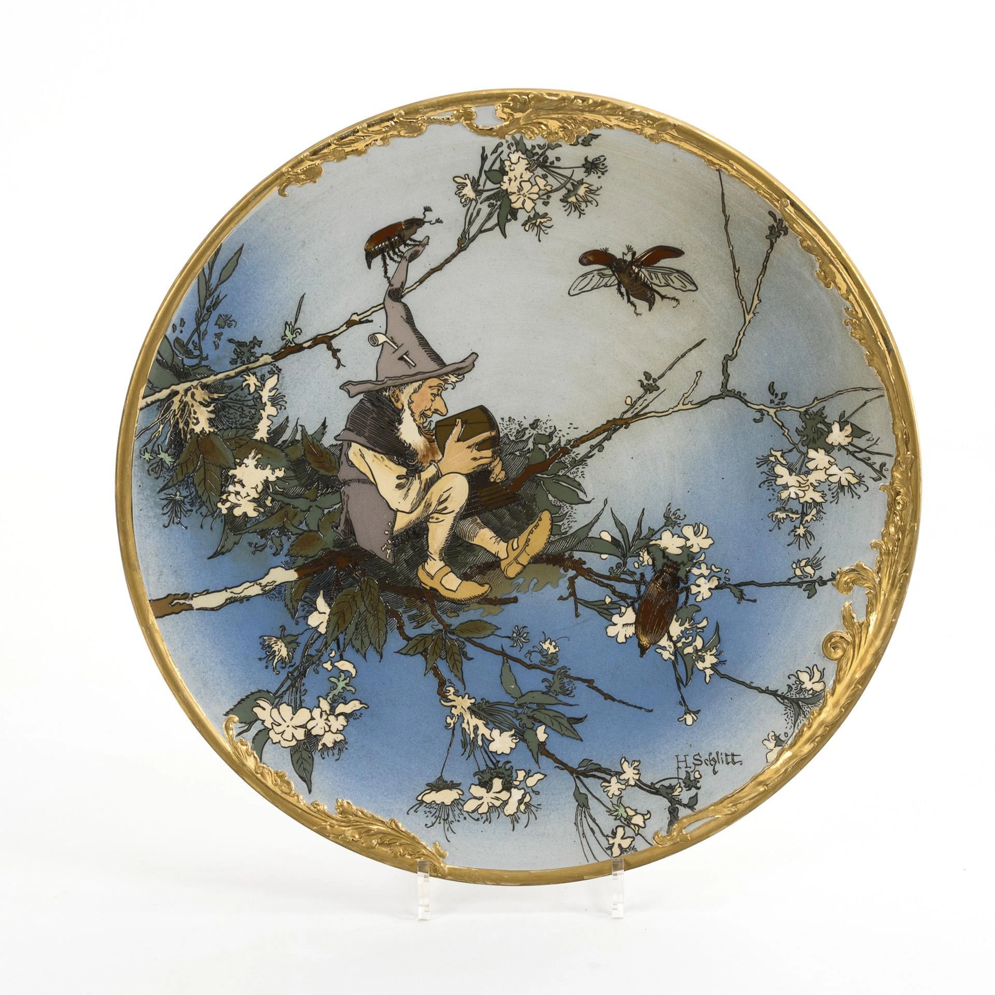 Large chromolite wall plate with dwarf motif. Villeroy & Boch.